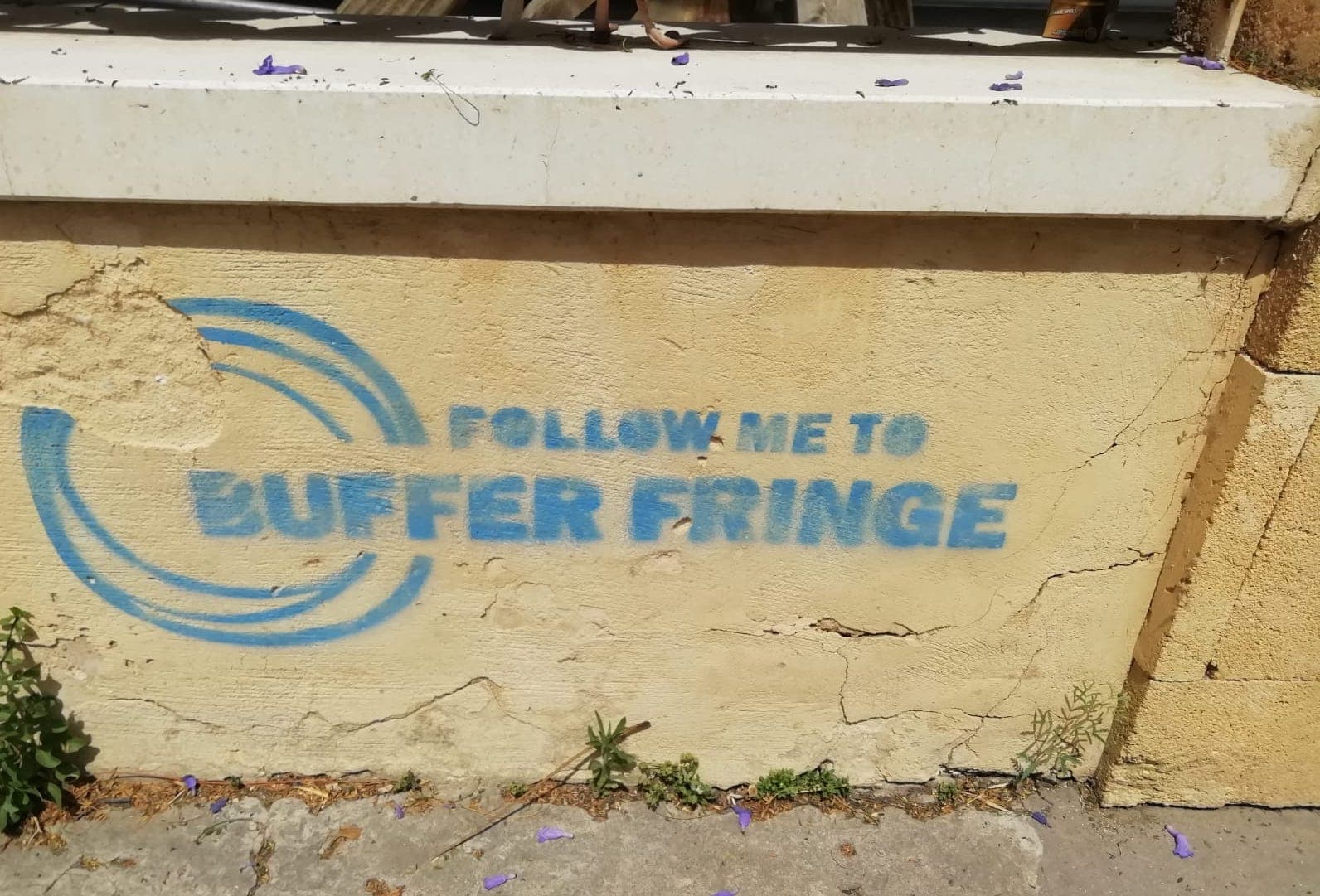 Graffiti seen on wall in Nicosia in blue lettering reads
