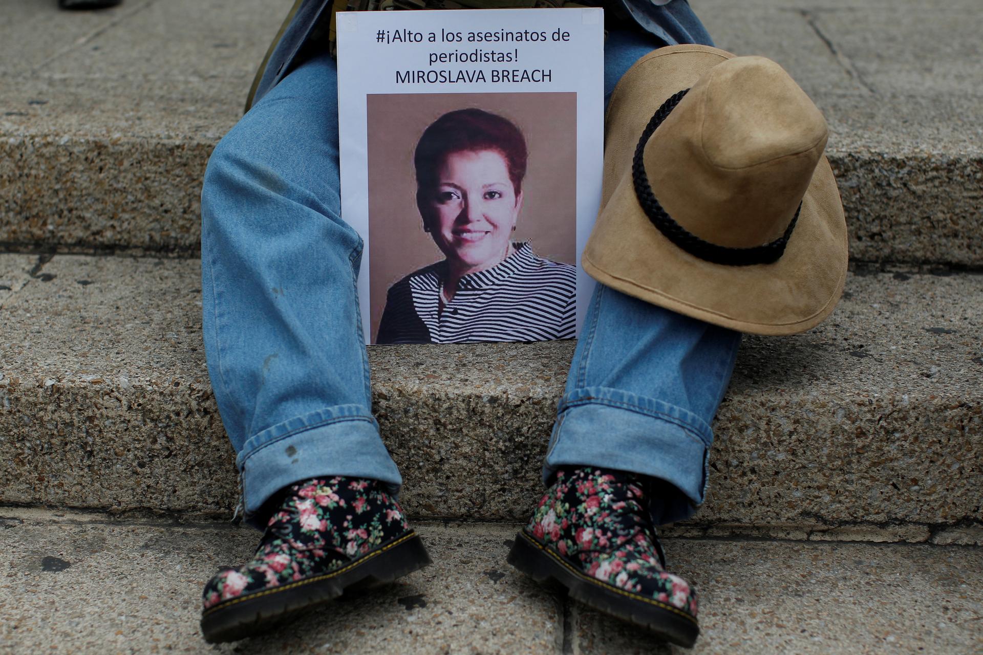 A picture of the Mexican journalist Miroslava Breach is seen during a protest against the murder of Miroslava, in Mexico City, Mexico March 25, 2017. Picture reads 