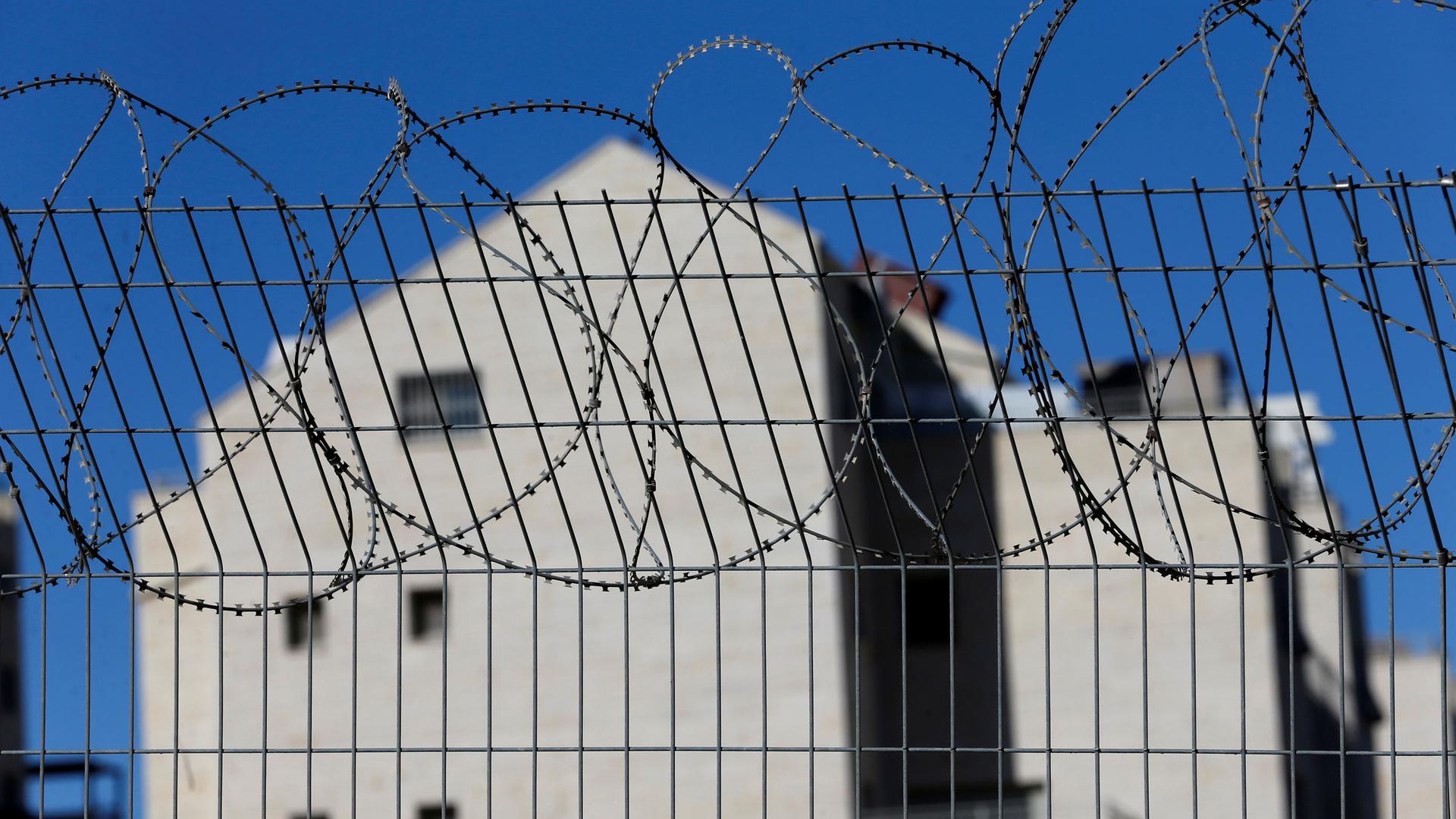 A fence is seen at the Jewish settlement of Kiryat Arba in Hebron, in the Israeli-occupied West Bank.