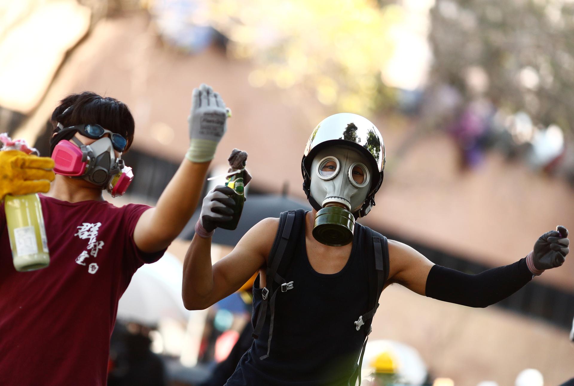 Protesters in Hong Kong wearing gas masks. 