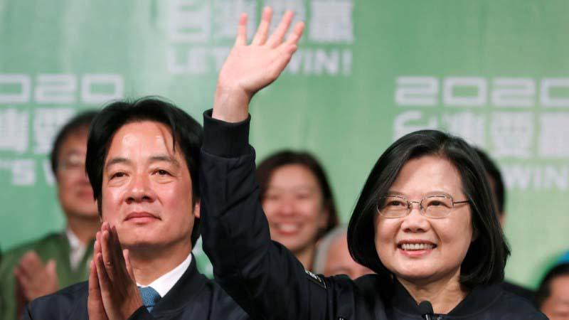 Incumbent Taiwan President Tsai Ing-wen, right, and Vice President-elect William Lai wave to their supporters after their election victory at a rally, outside the Democratic Progressive Party (DPP) headquarters in Taipei, Taiwan, on January 11, 2020.