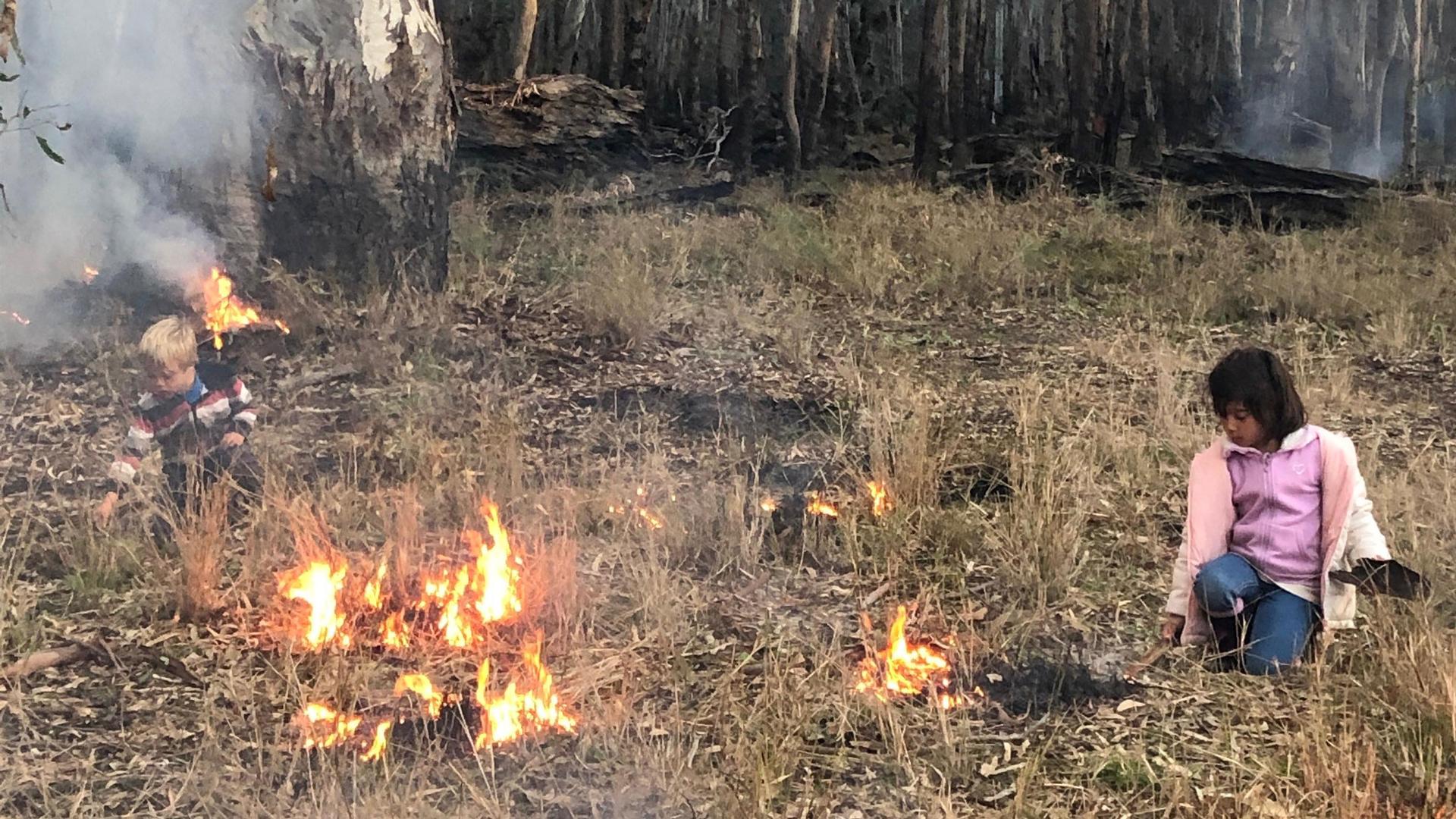 Vanessa Cavanagh's children at the National Indigenous Fire Workshop Dhungala in 2019.