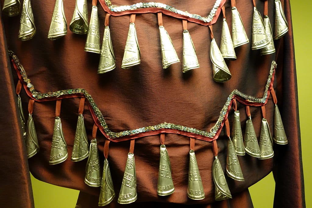 A close up of a jingle dress