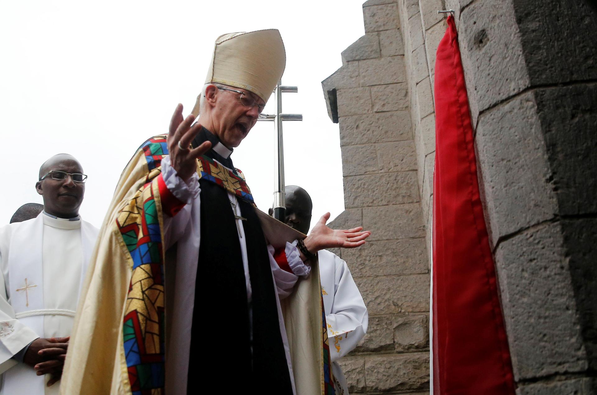 Archbishop of Canterbury Justin Welby prays outside the church after attending a special service at the Anglican Church of Kenya St. Stephen's Cathedral in Nairobi, Kenya January 26, 2020.