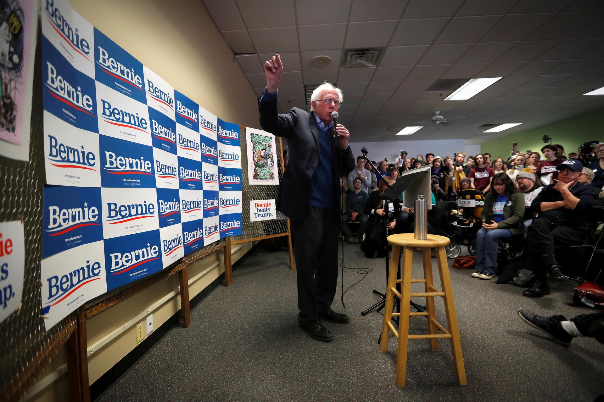 Democratic US presidential candidate Sen. Bernie Sanders speaks to supporters and volunteers at a campaign field office in Iowa City, Iowa, Feb. 2, 2020. 