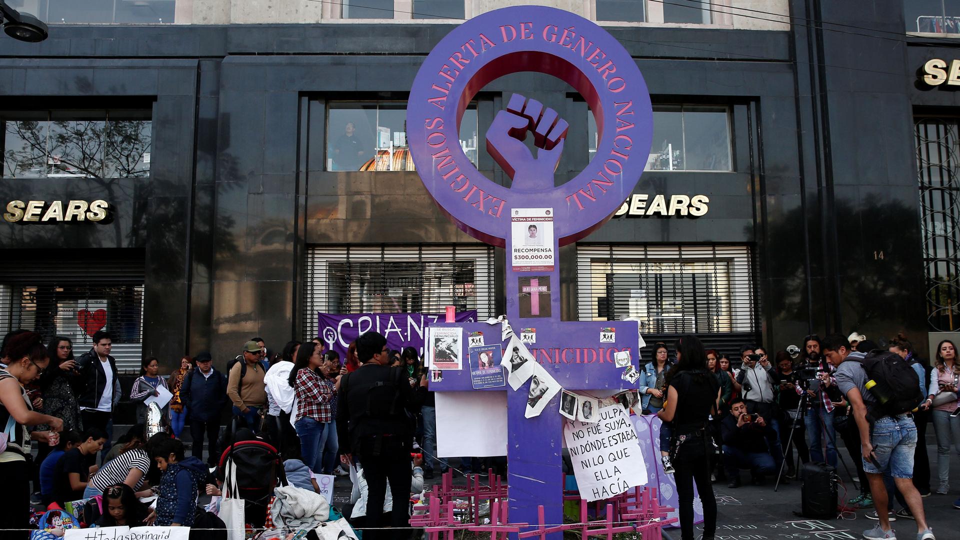 People gather in a memory of seven-year-old Fatima Cecilia Aldrighett, who went missing and whose body was discovered inside a plastic bag, at an anti-femicide monument, in Mexico City, Mexico, Feb. 19, 2020. 