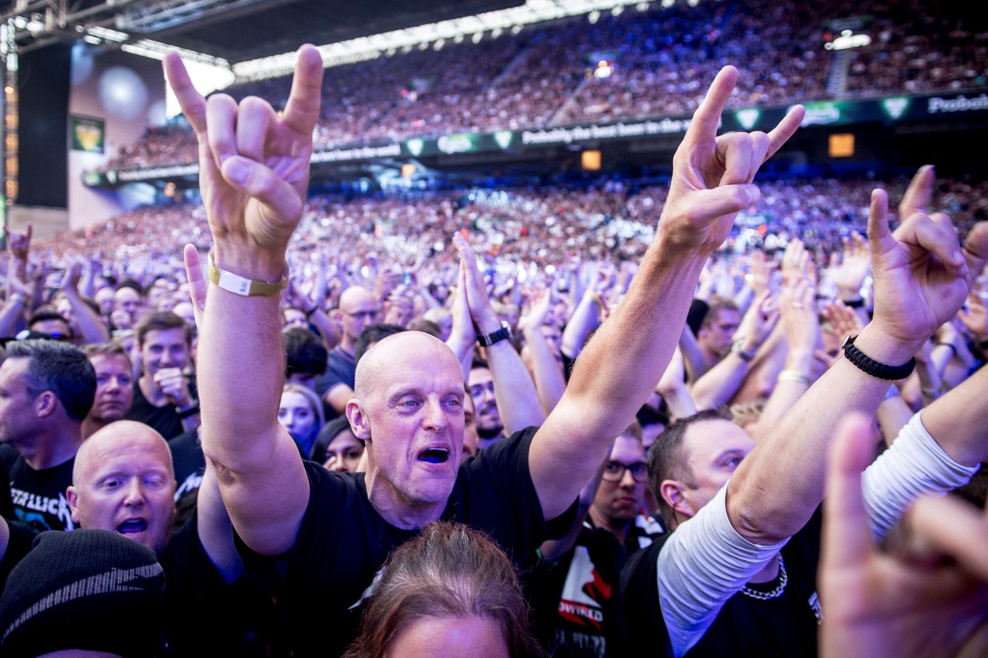 a crowd at a Metallica concert in Denmark.
