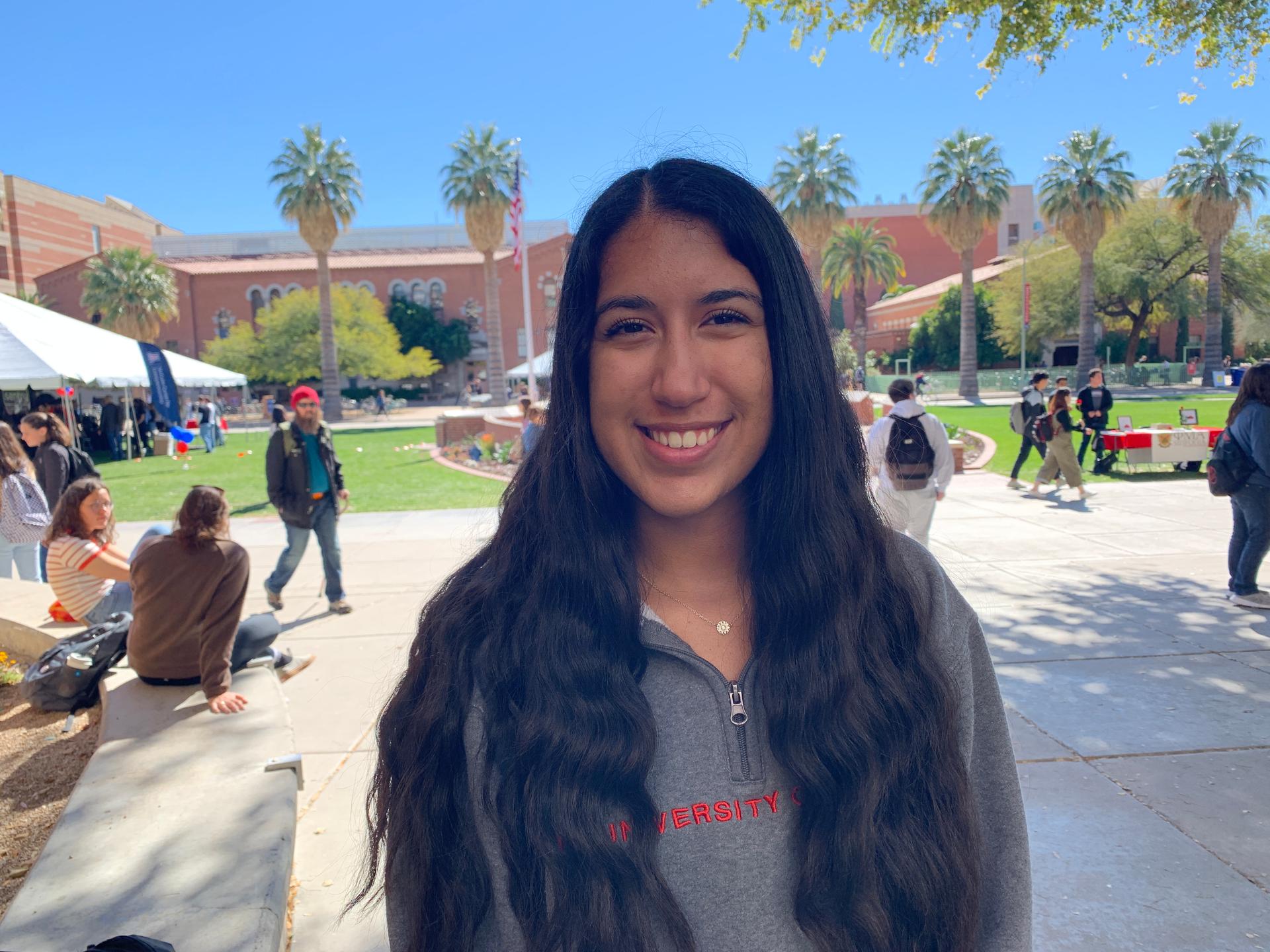 Adela Diaz, who will be a first-time voter in 2020, poses on her campus at the University of Arizona in Tucson.