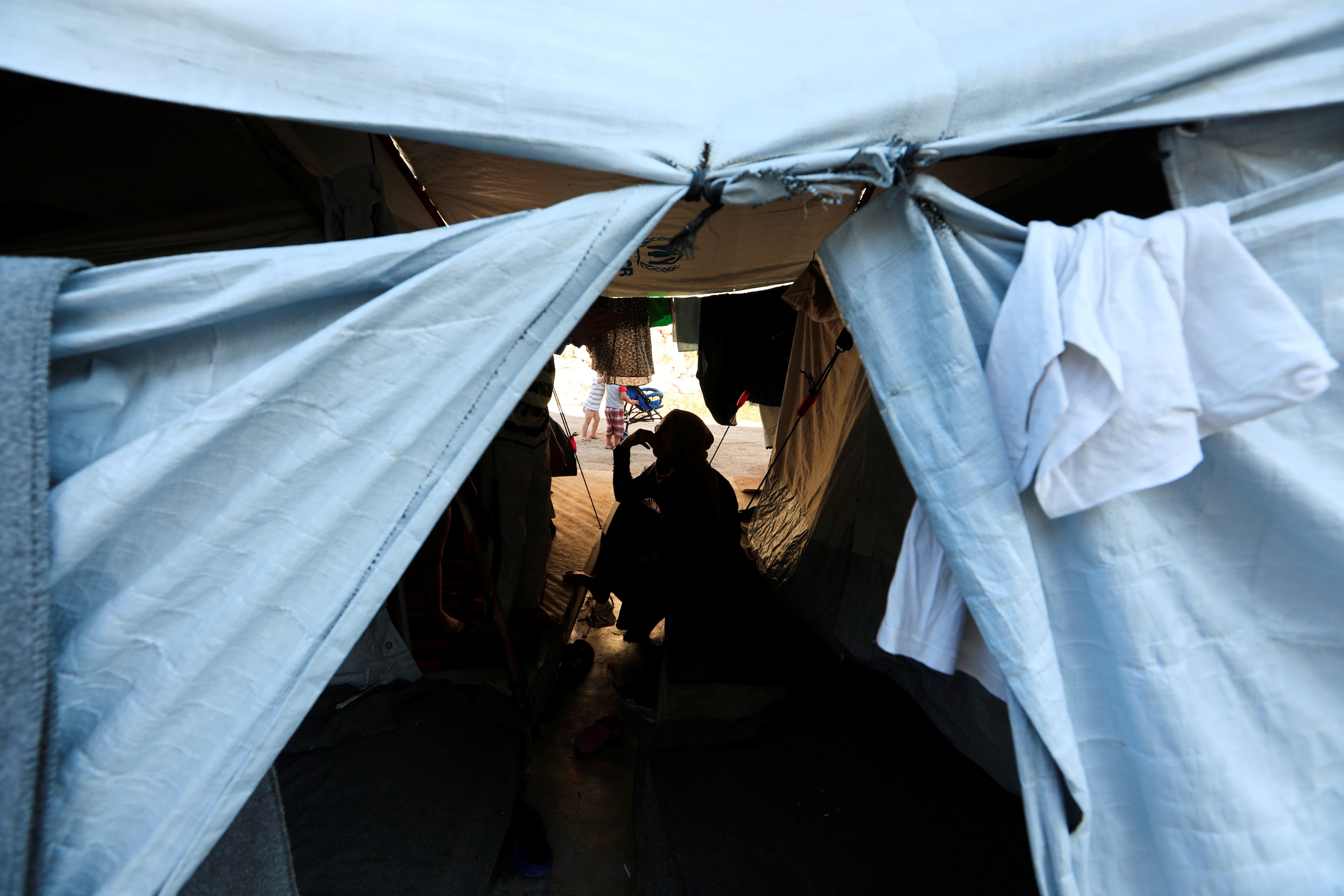 A refugee woman is pictured at the Souda Refugee Camp in Chios island, Greece, June 10, 2017.