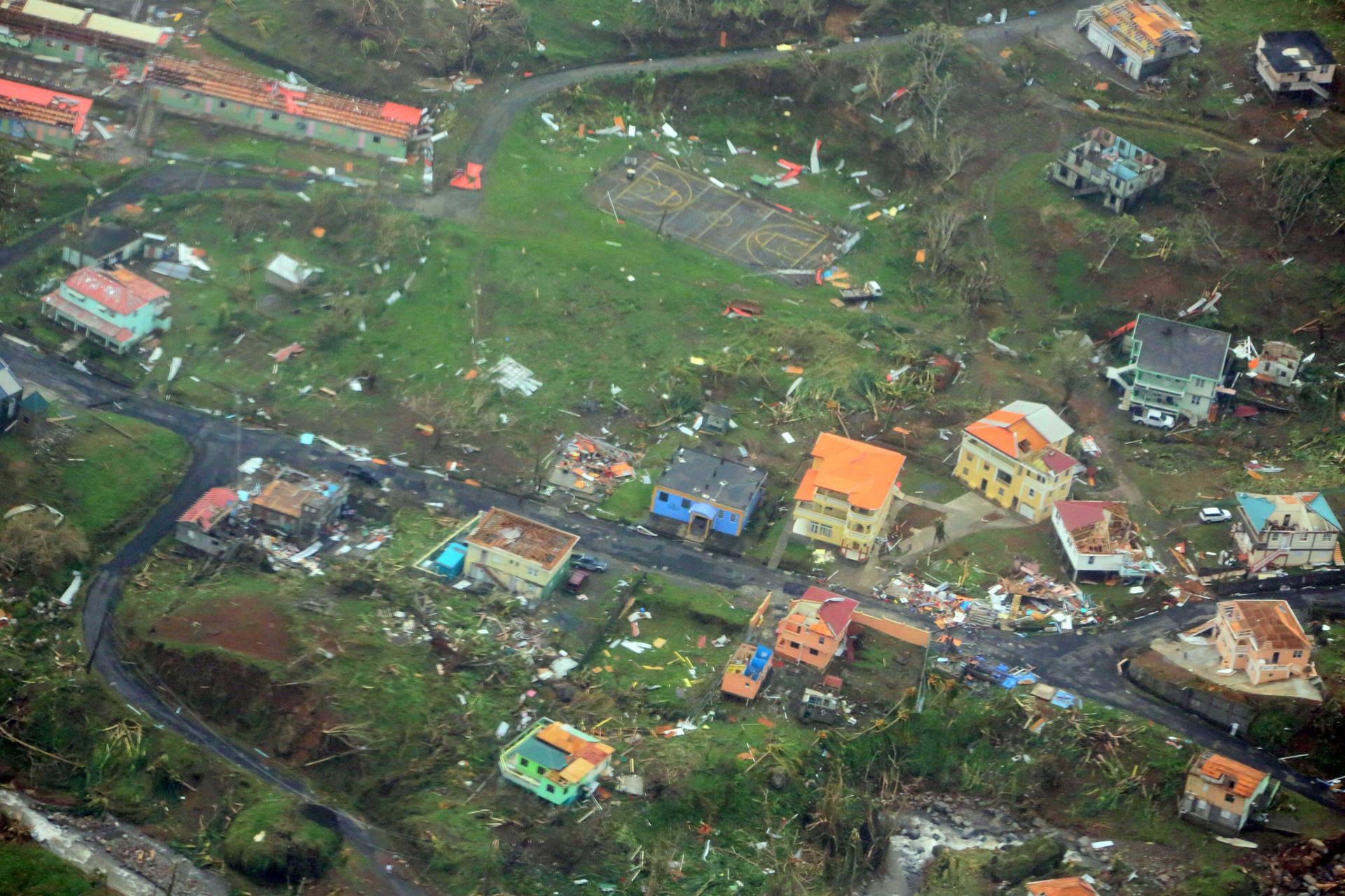 Damaged homes from Hurricane Maria are shown in this aerial photo over the island of Dominica, Sept. 19, 2017. 