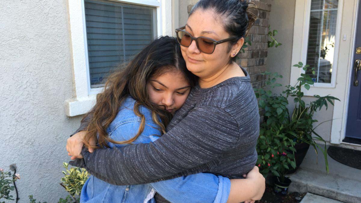 Guadalupe Garcia (left) hugs her mother Gabriela Garcia.