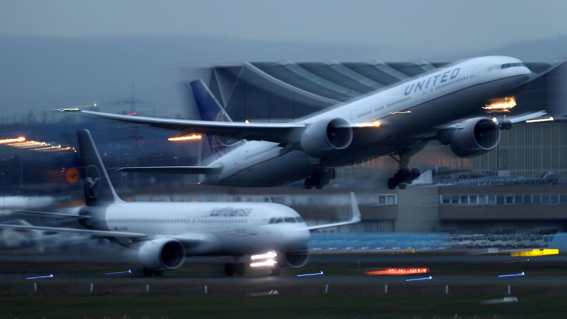 Airplanes of German airline Lufthansa and US carrier United Airlines land and take off at Frankfurt Airport, Germany March 2, 2020.