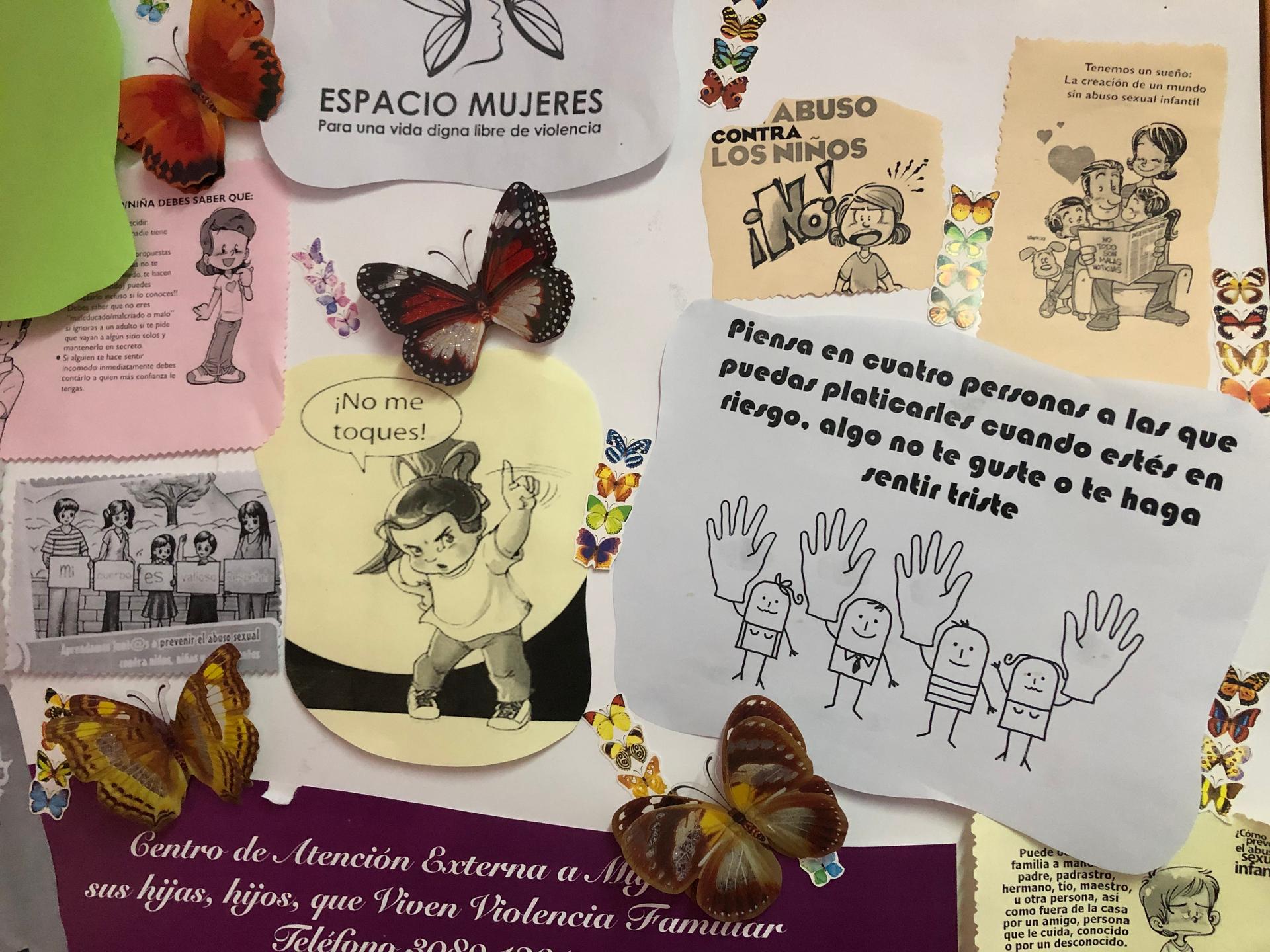 Signs at a women's shelter in Mexico City encourage female empowerment and tips for women facing violence.