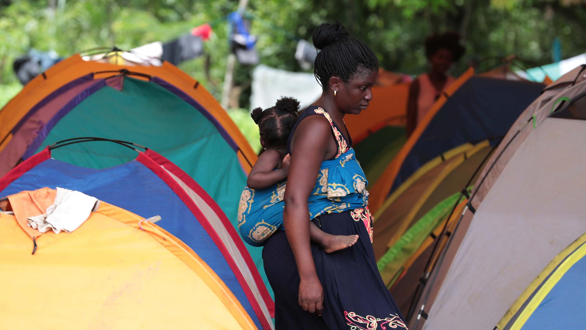 Migrants are seen at temporary shelter in the village of La Penita, Panama, on August 23, 2019.
