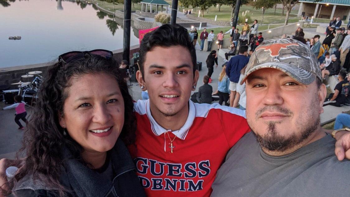 Izcan Ordaz, middle, alongside his mother Xochitl Ortiz, right, and father, Simon Ordaz.