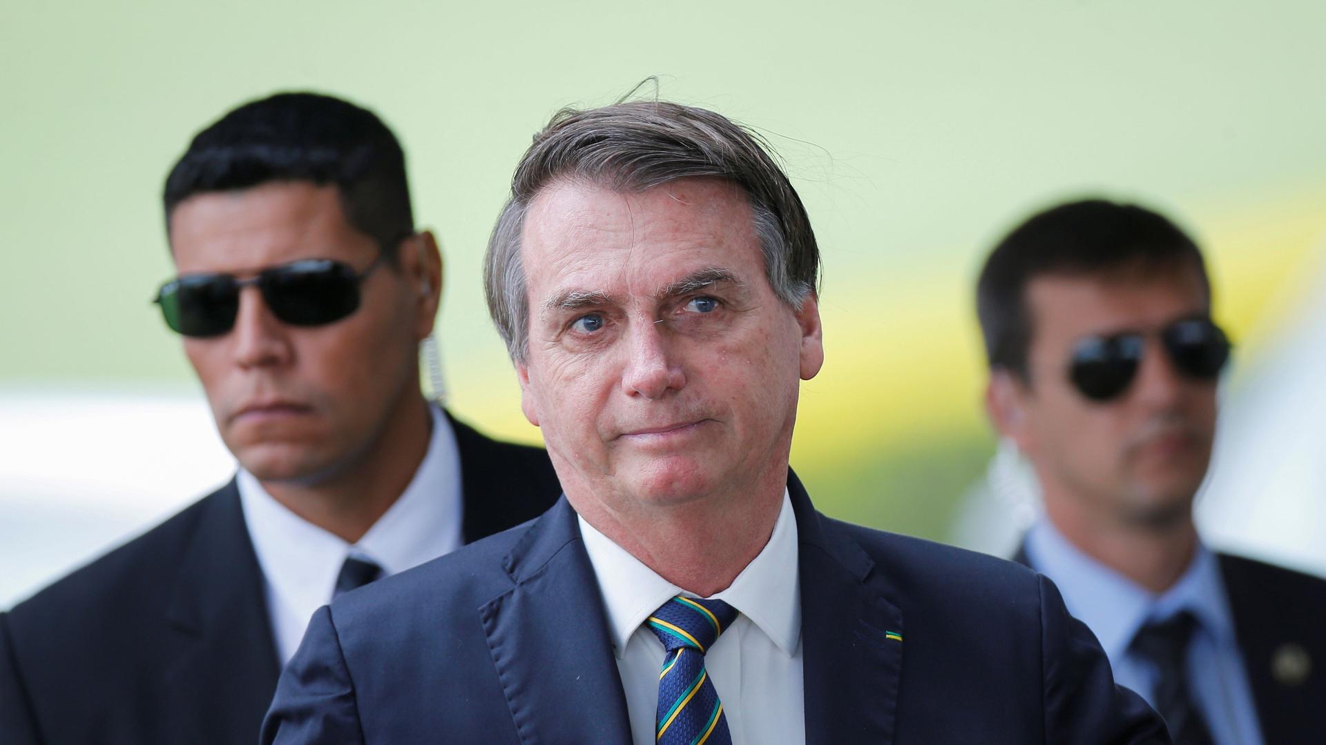 Brazil's President Jair Bolsonaro leaves Alvorada Palace, amid the coronavirus disease (COVID-19) outbreak, in Brasilia, Brazil, April 14, 2020. 