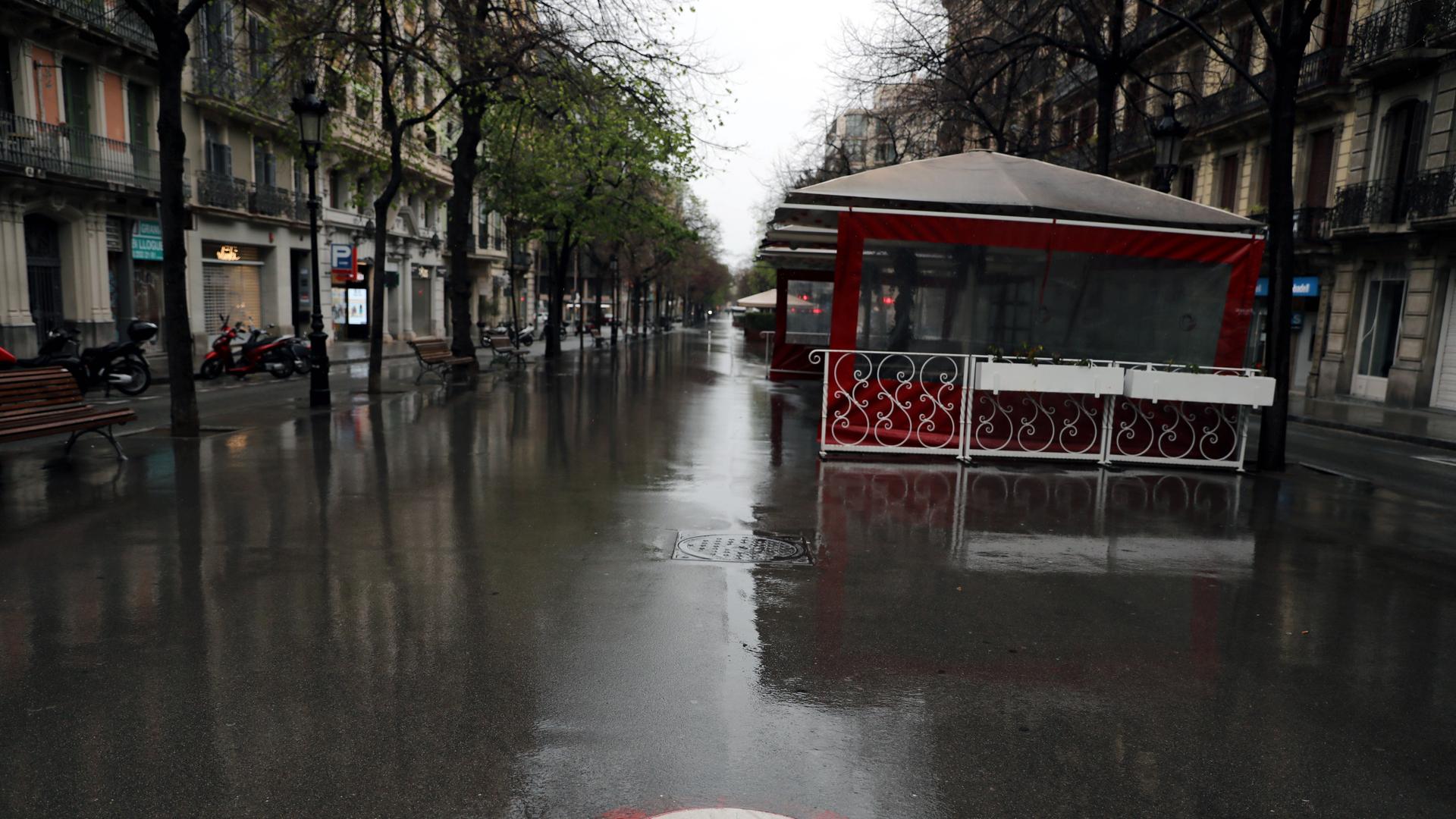 A deserted Rambla de Catalunya street is pictured during the outbreak of the coronavirus disease (COVID-19), in Barcelona, Spain, March 31, 2020. 