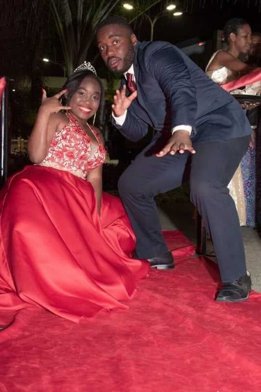 Brayan Guevara, right, and his cousin at her 2019 quinceañera celebration in Trujillo, Honduras.