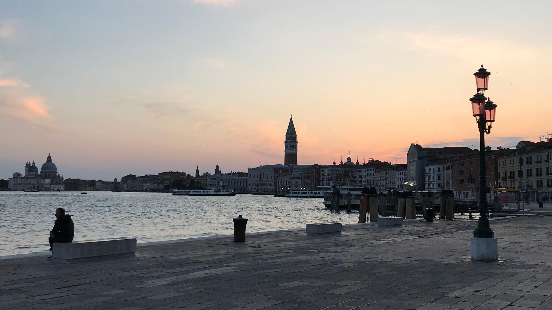 The San Marco basin in Venice appears placid as a result of the slowdown in activity with the country's lockdown in response to the coronavirus.