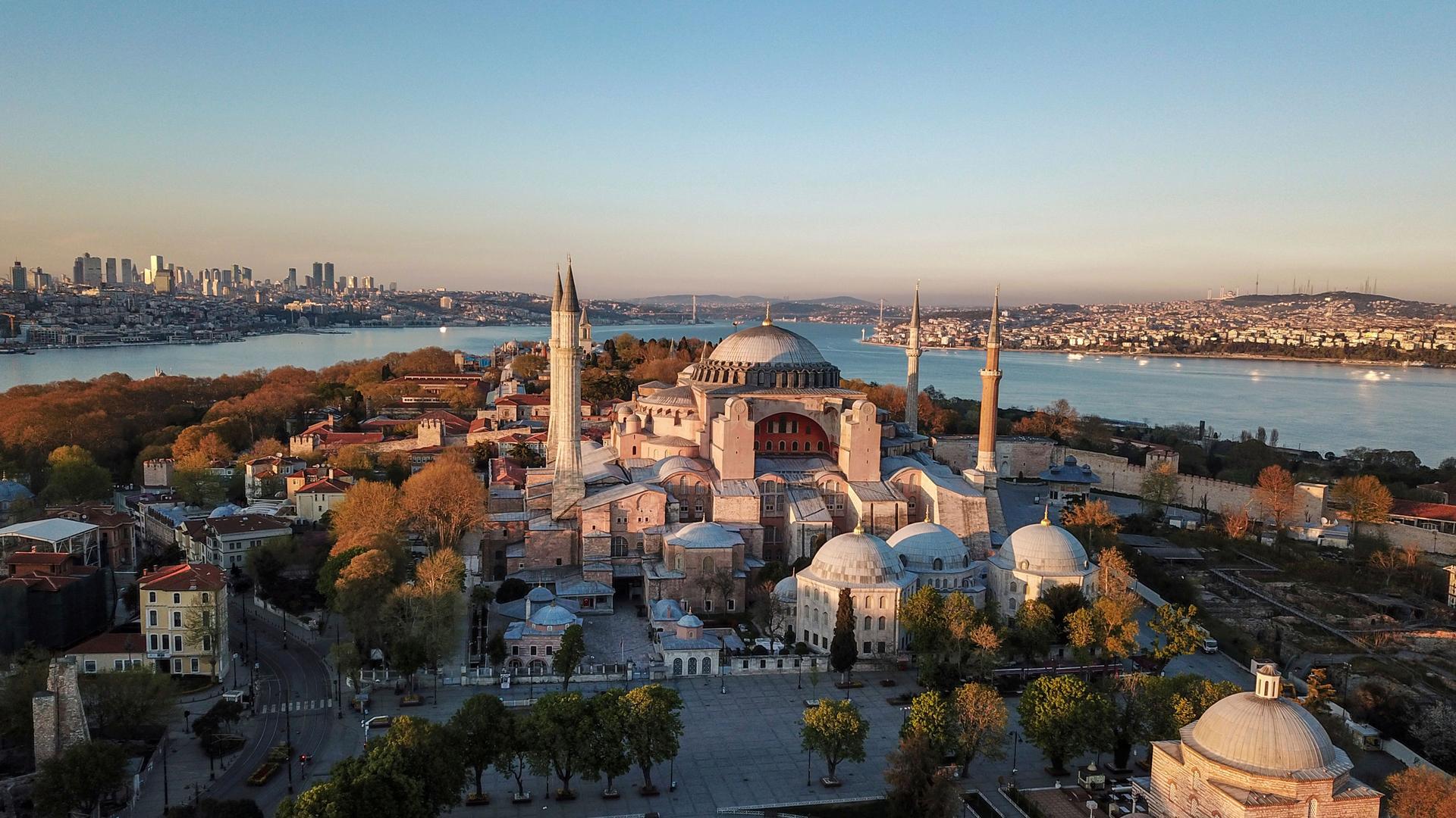 The large dome of the UNESCO World Heritage site Hagia Sophia is shown from above at a distance.