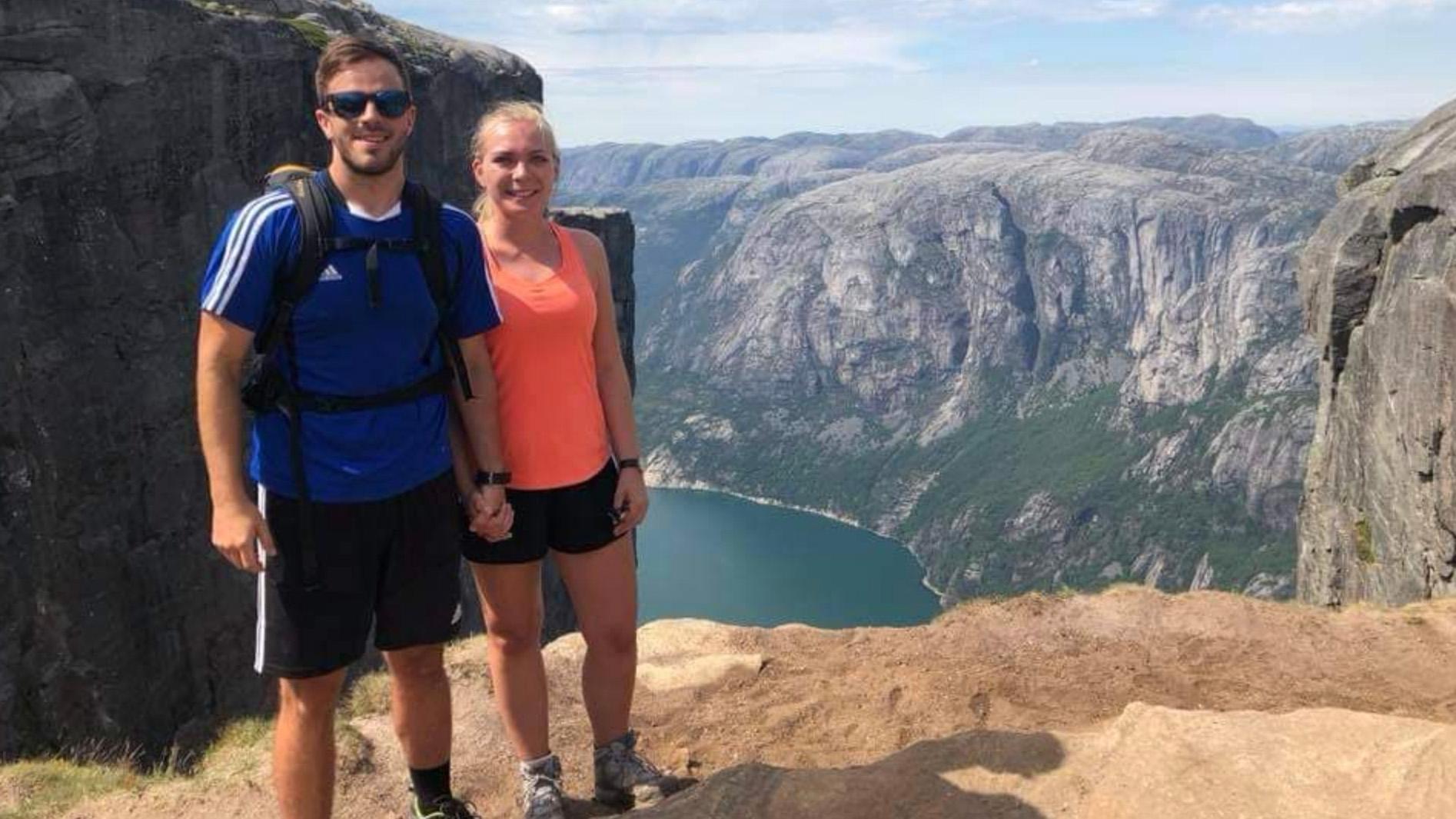 Luke DeBoer, left, and fiancée Ida Marie Rygg on a trip to Kjerag mountain in Norway. Closed borders during the coronavirus pandemic separated them for months.