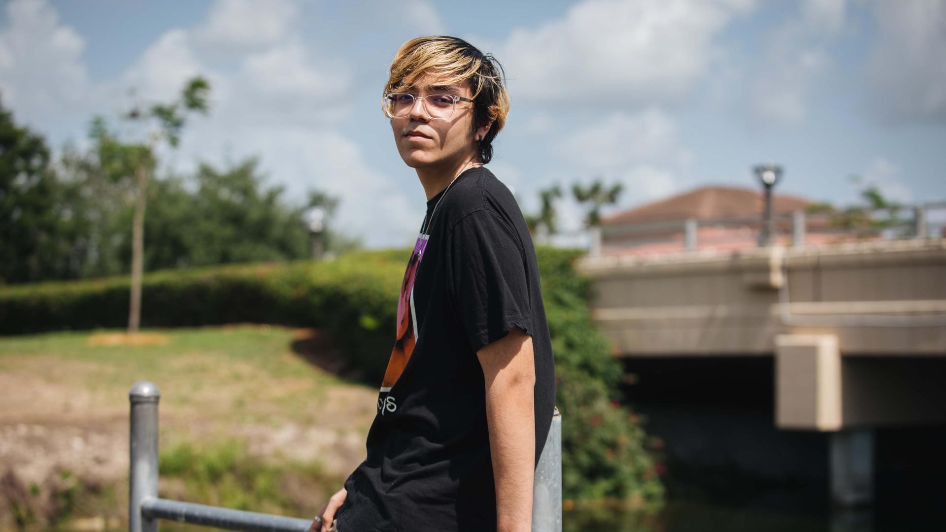Jacob Cuenca, 18, a registered Republican, poses outside his home in Homestead, Florida, on May 21, 2020. 