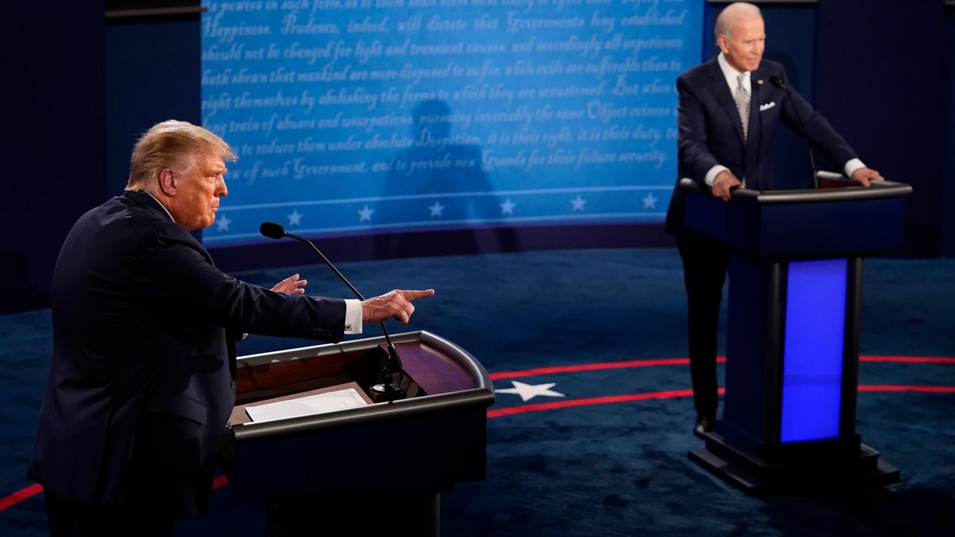 President Donald Trump points as Democratic presidential candidate former Vice President Joe Biden listens during the first presidential debate, Sept. 29, 2020, at Case Western University and Cleveland Clinic, in Cleveland, Ohio.