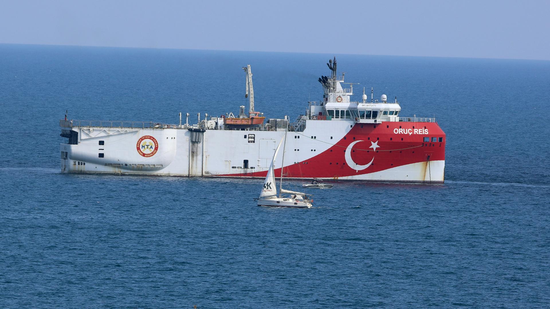 A Turkish ship with a flag sails in the eastern Mediterranean Sea 