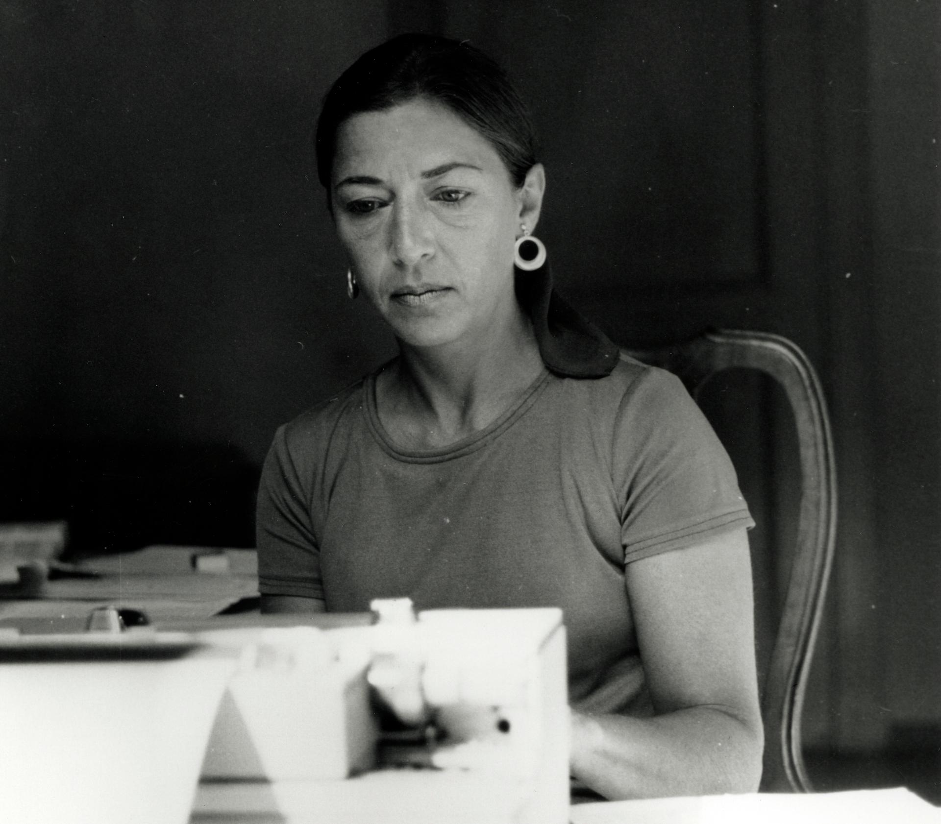 Black and white photo of young Ruth Bader Ginsburg wearing a casual shirt with her hair pulled back