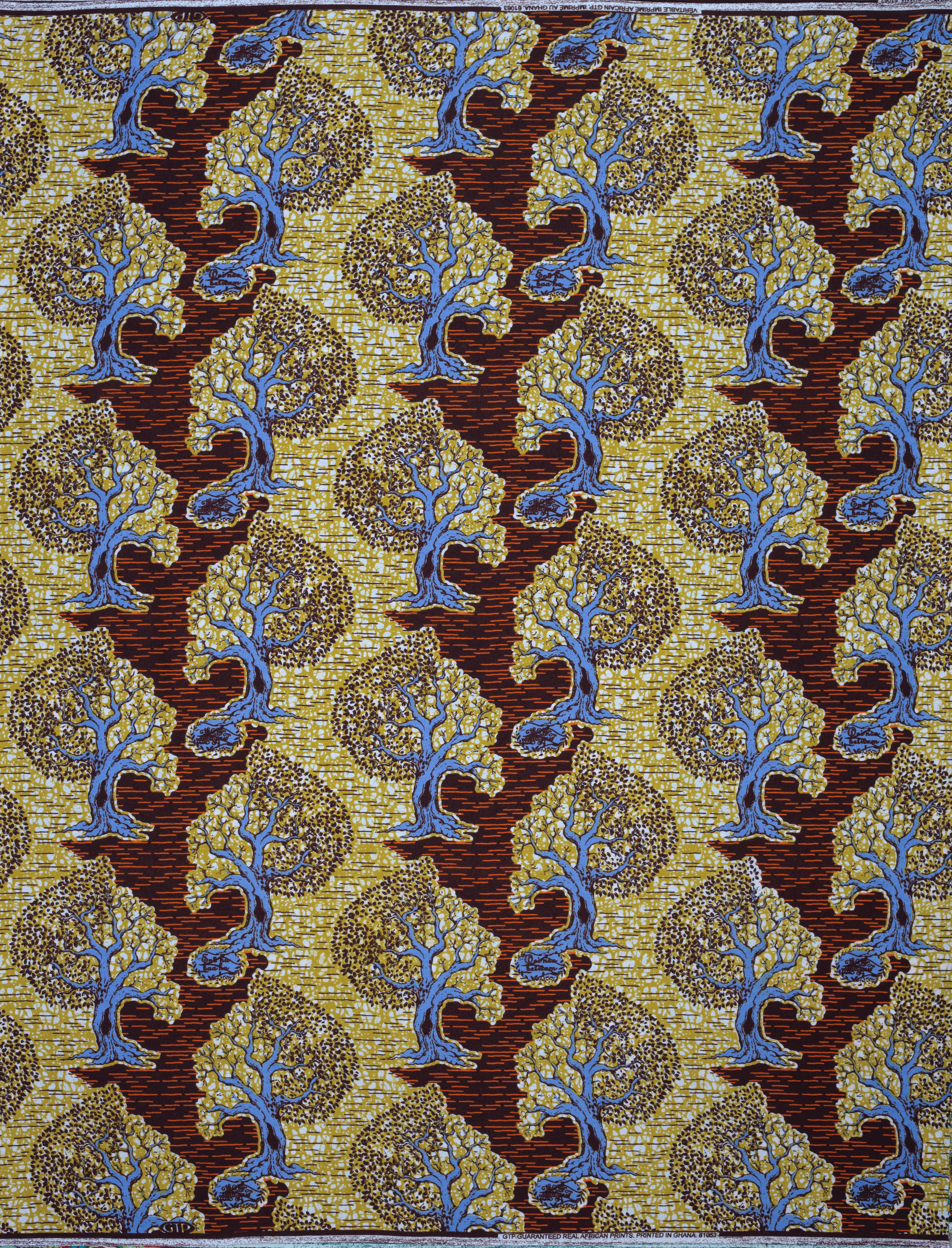 A new design from Ghana Textiles Printing out this week depicts a tree with half of its branches withered and the other half alive and budding.
