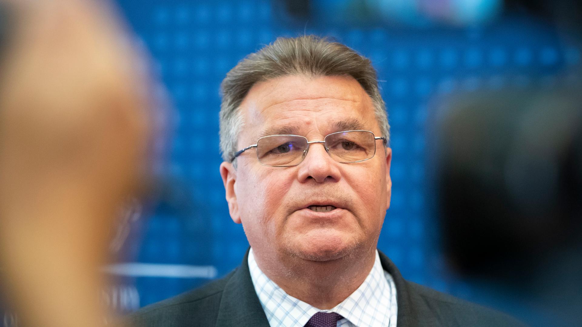 A close-up photo of Lithuania's Minister of Foreign Affairs Linas Linkevicius as he answers questions during a meeting with the press in the Ministry of Foreign Affairs in Vilnius, Lithuania, Aug. 11, 2020.