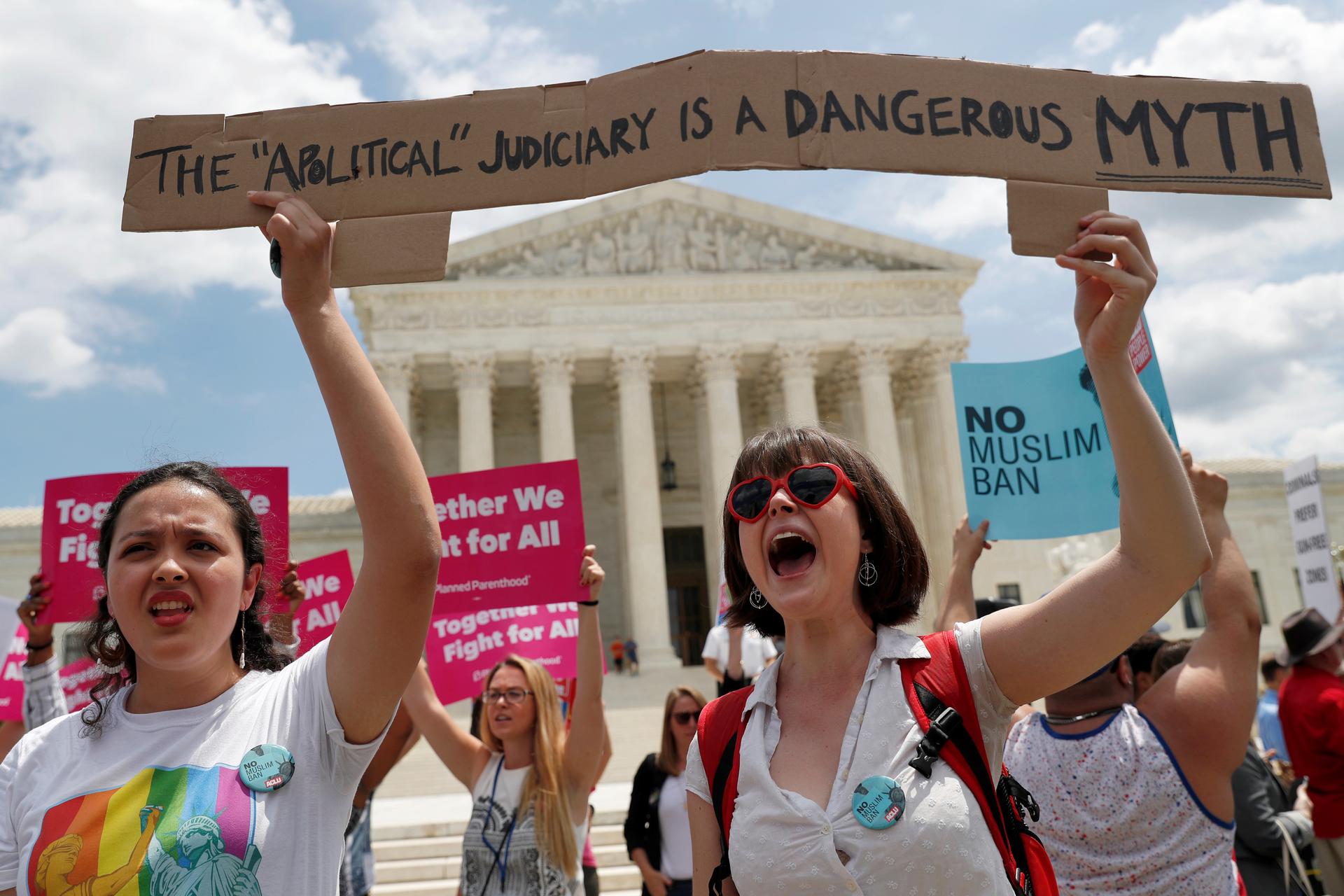 Two woman protestors outside the Supreme Court.