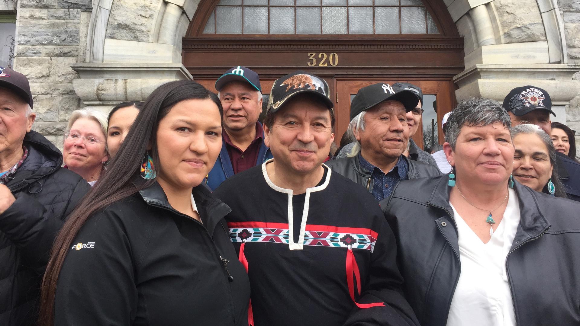 Rick Desautel, flanked by his daughter and his wife, Linda (right), celebrates his acquittal of illegal hunting charges outside the provincial courthouse in Nelson, British Columbia, in March 2017.