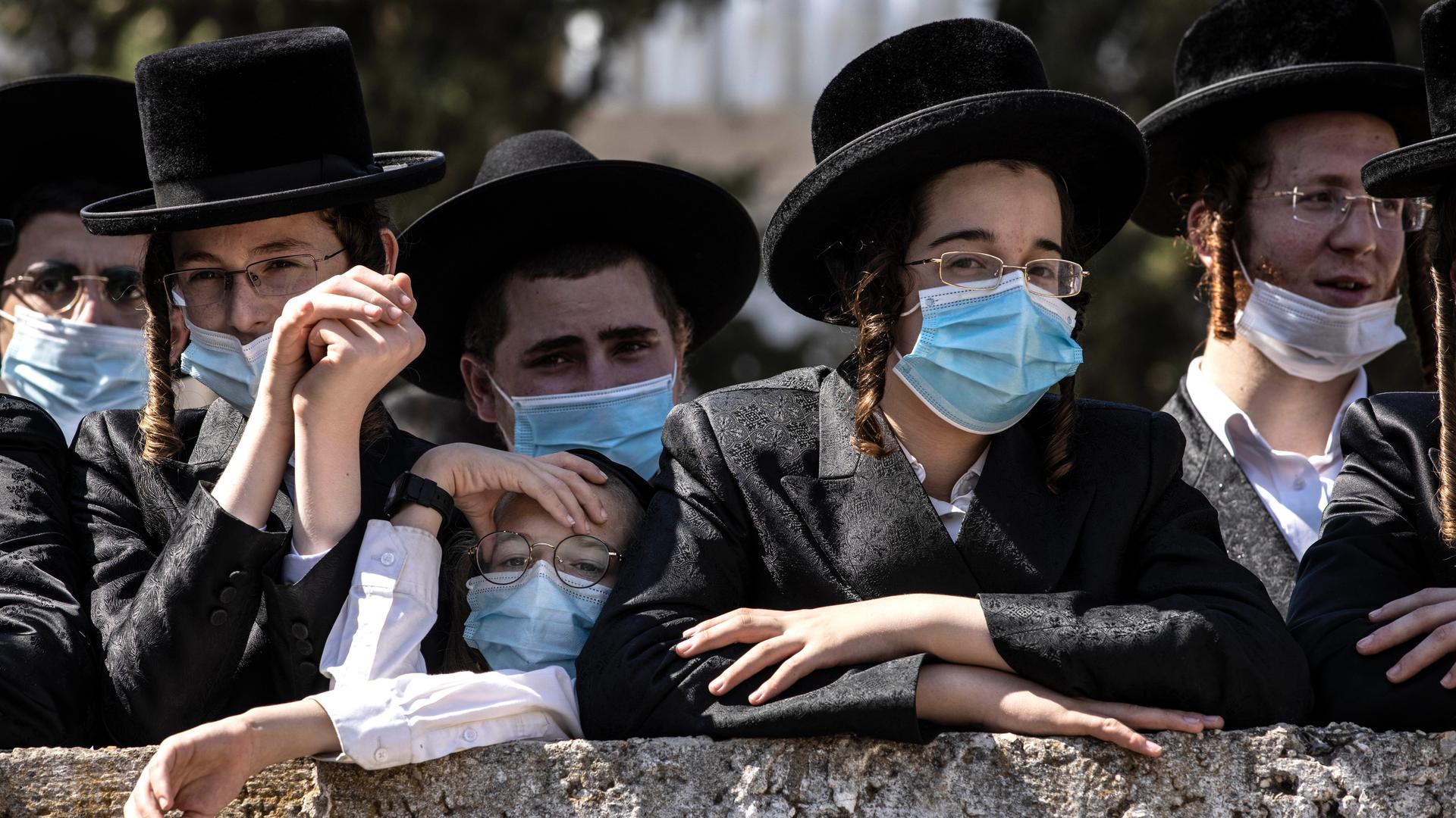 Ultra-Orthodox Jewish teens attend the funeral for Rabbi Mordechai Leifer in Ashdod, Israel, Oct. 5, 2020.
