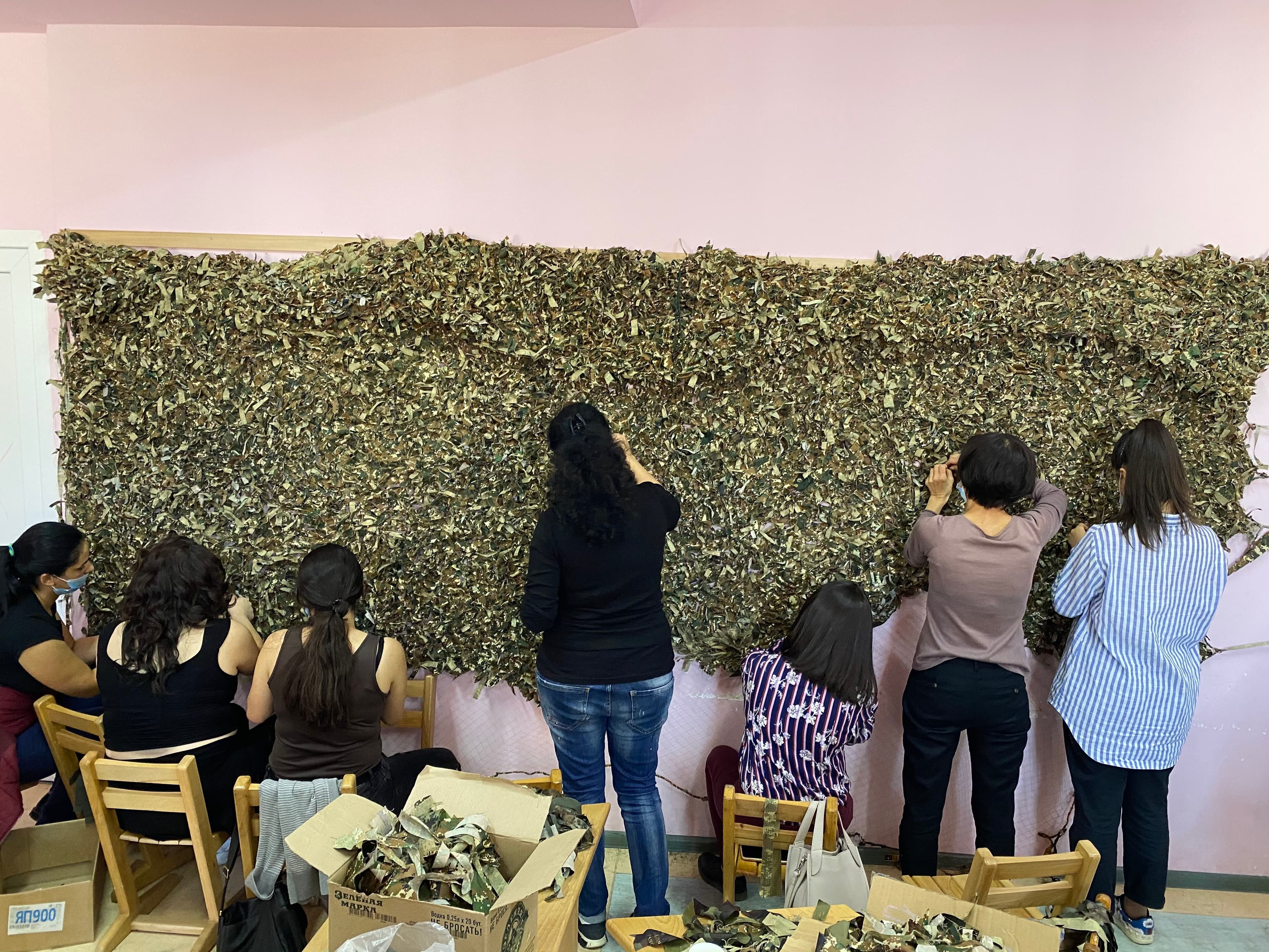 Women volunteers construct camouflage nets to be used on the Nagorno-Karabakh frontlines.