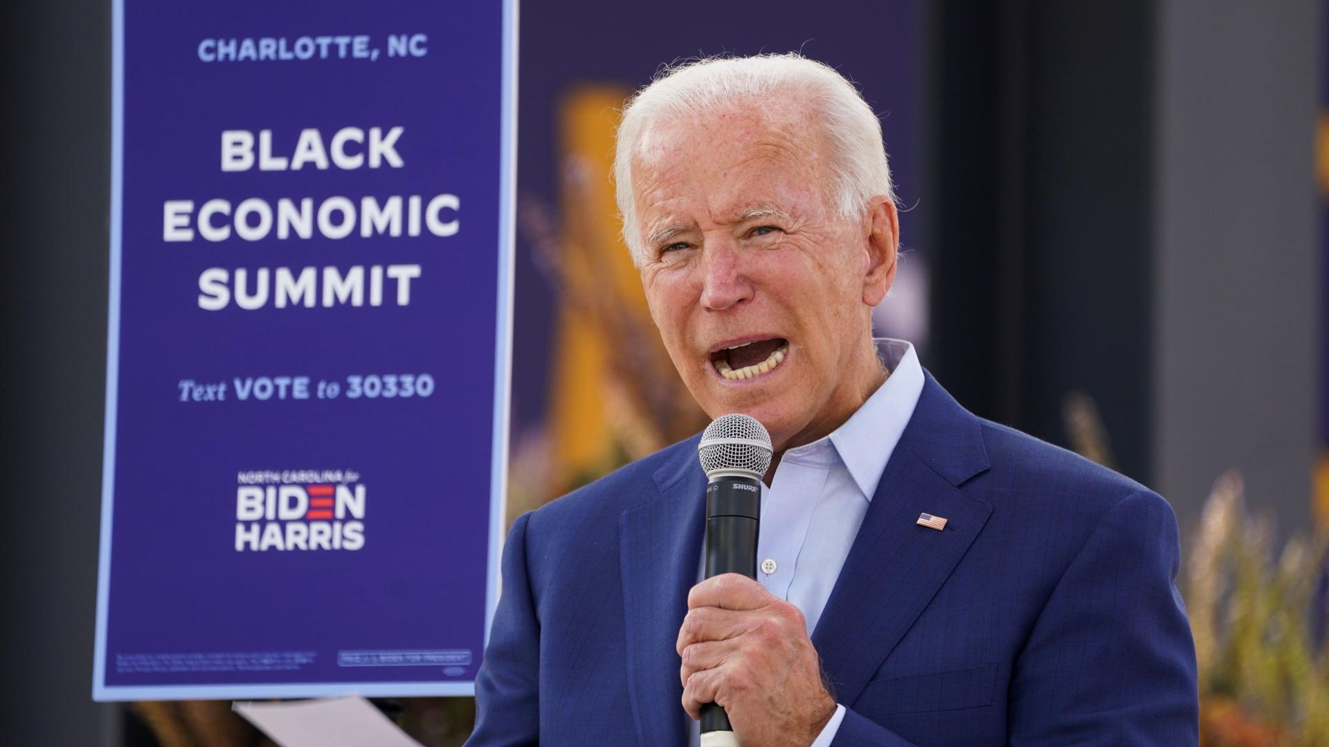 Democratic US presidential nominee Joe Biden speaks at an outdoor "Black Economic Summit" while campaigning for president in Charlotte, North Carolina, Sept. 23, 2020. 