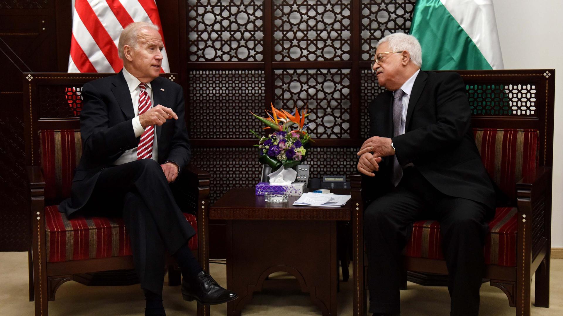 US President-elect Joe Biden, left, who was then US Vice President, and Palestinian President Mahmoud Abbas, meet at the presidential compound in Ramallah, West Bank, March 9, 2016.