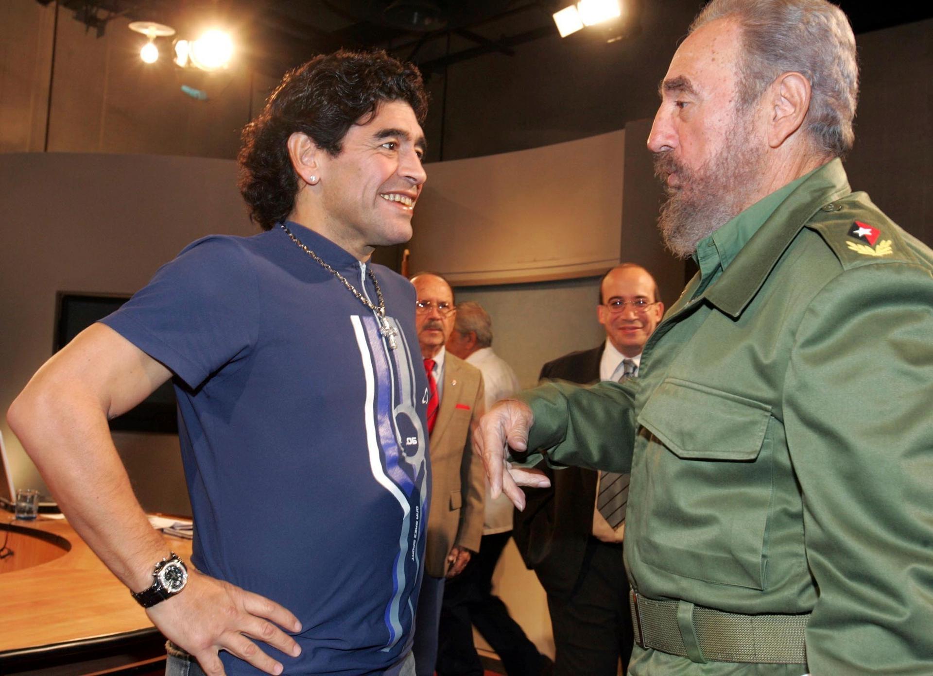 In this Oct. 27, 2005 file photo released by the Cuban government's National Information Agency (AIN), Cuban President Fidel Castro, right, meets Argentina's former soccer star Diego Maradona on the program 