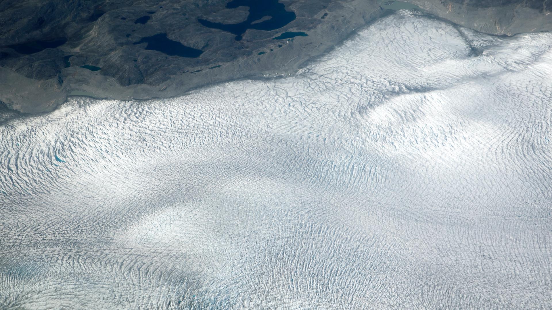 A vast, white sheet of ice
