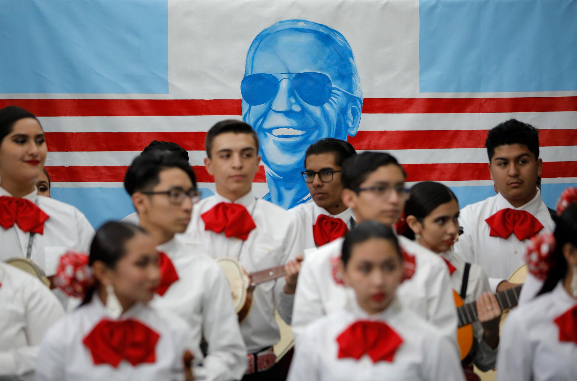 In this Jan. 11, 2020, file photo, a mariachi band waits to perform before a campaign event with former Vice President and Democratic presidential candidate Joe Biden in Las Vegas. 
