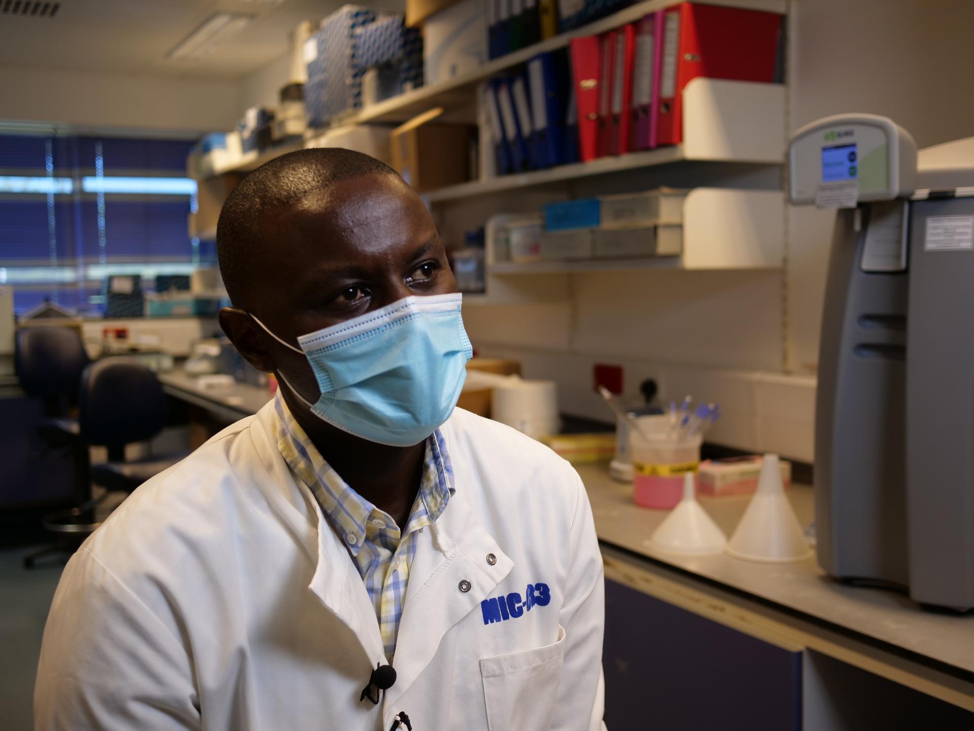 KEMRI’s principal investigator, George Warimwe, for the Oxford AstraZeneca COVID-19 vaccine trial is shown at the KEMRI Wellcome Trust lab in Kilifi, Kenya, on Nov. 13, 2020.