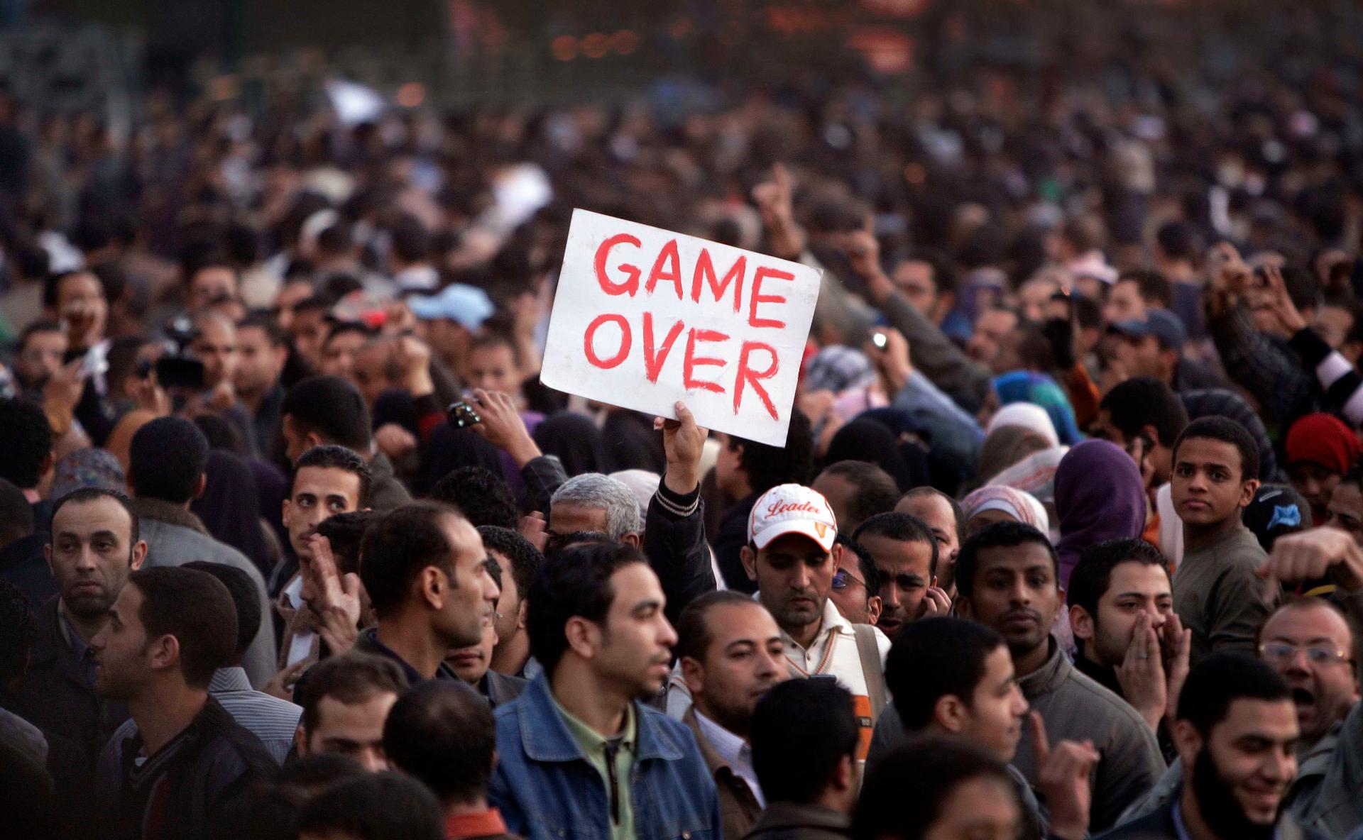 In this Jan. 29, 2011 file photo, anti-government protesters gather in Tahrir Square, Cairo, Egypt.