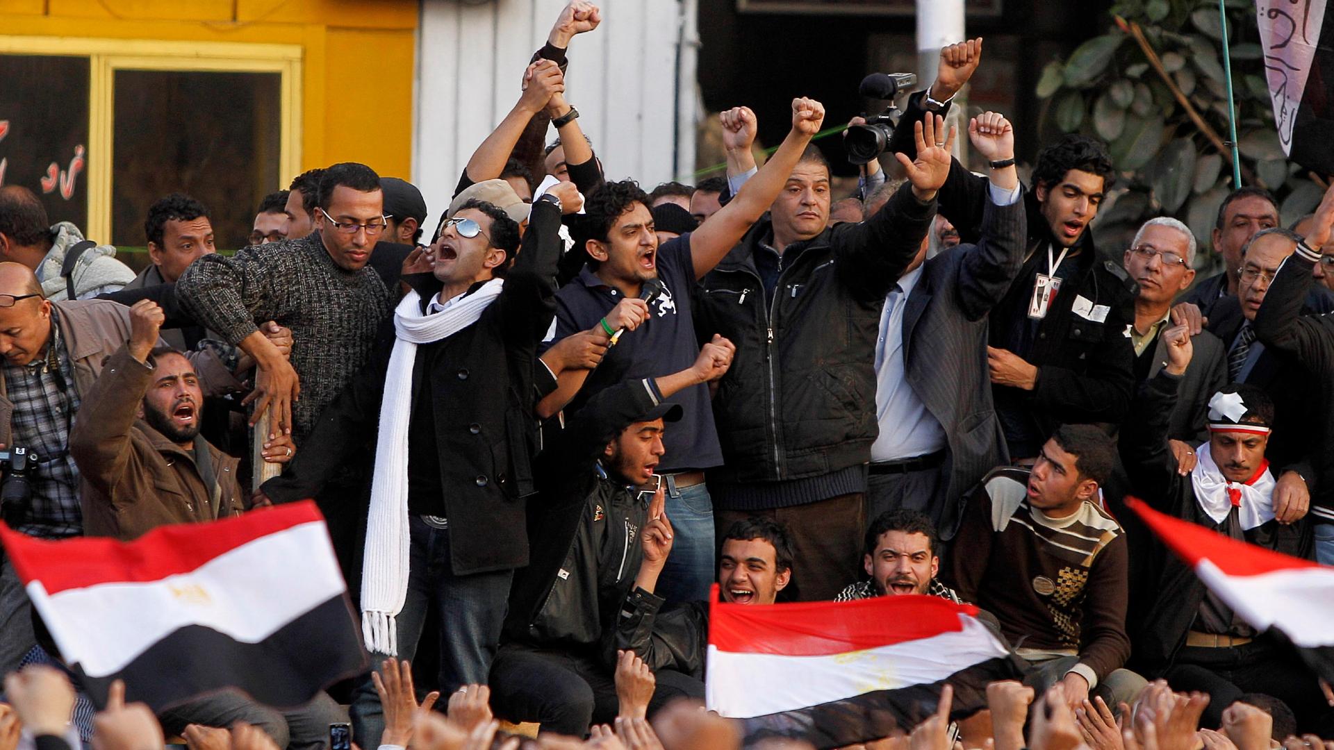 In this Feb. 8, 2011, file photo, a leader of Egypt's anti-government protesters, Egyptian Wael Ghonim, center, 30, a Google Inc. marketing manager who was a key organizer of the online campaign that sparked the first protest on Jan. 25. 
