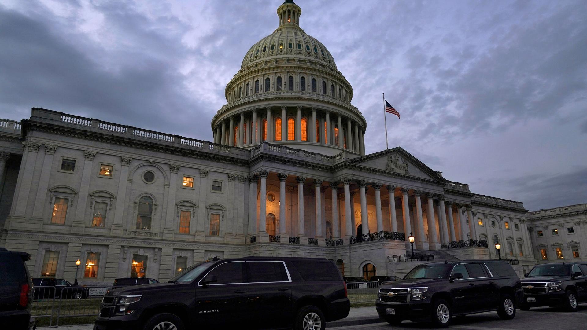 Dusk falls over the Capitol, Dec. 21, 2020, in Washington.