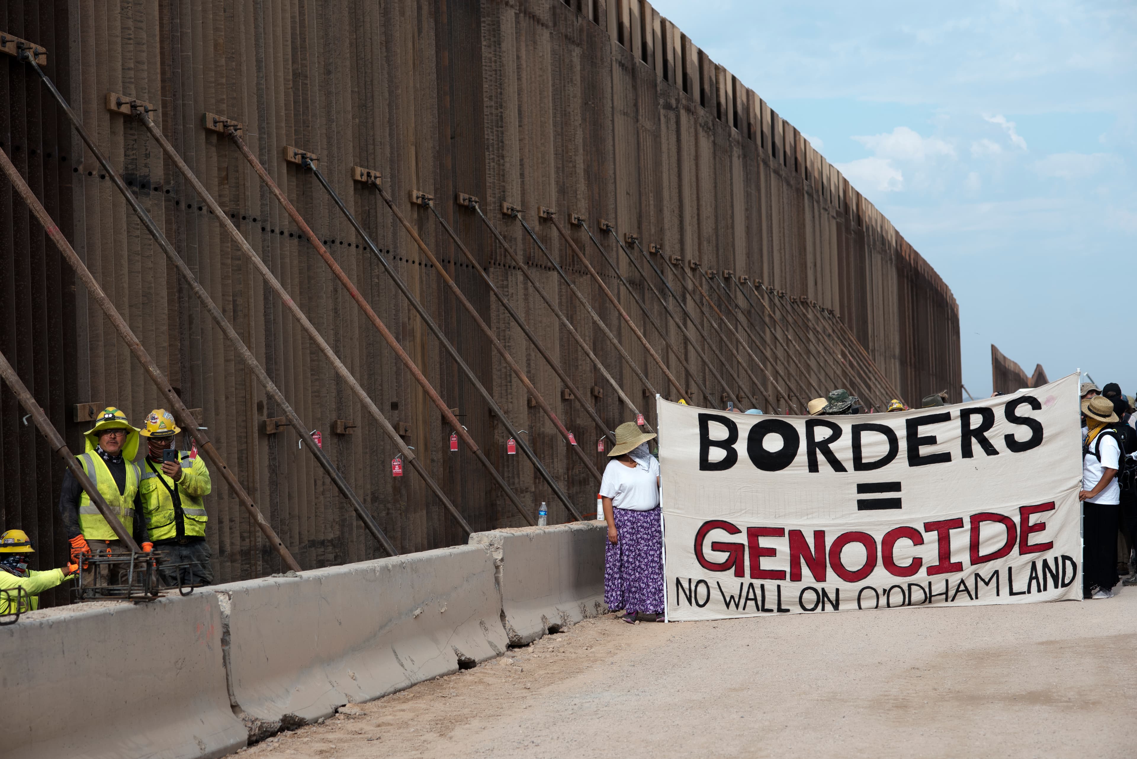 Protesters say they will hold President-elect Joe Biden to account on his promise to stop the Trump administration's border wall construction.