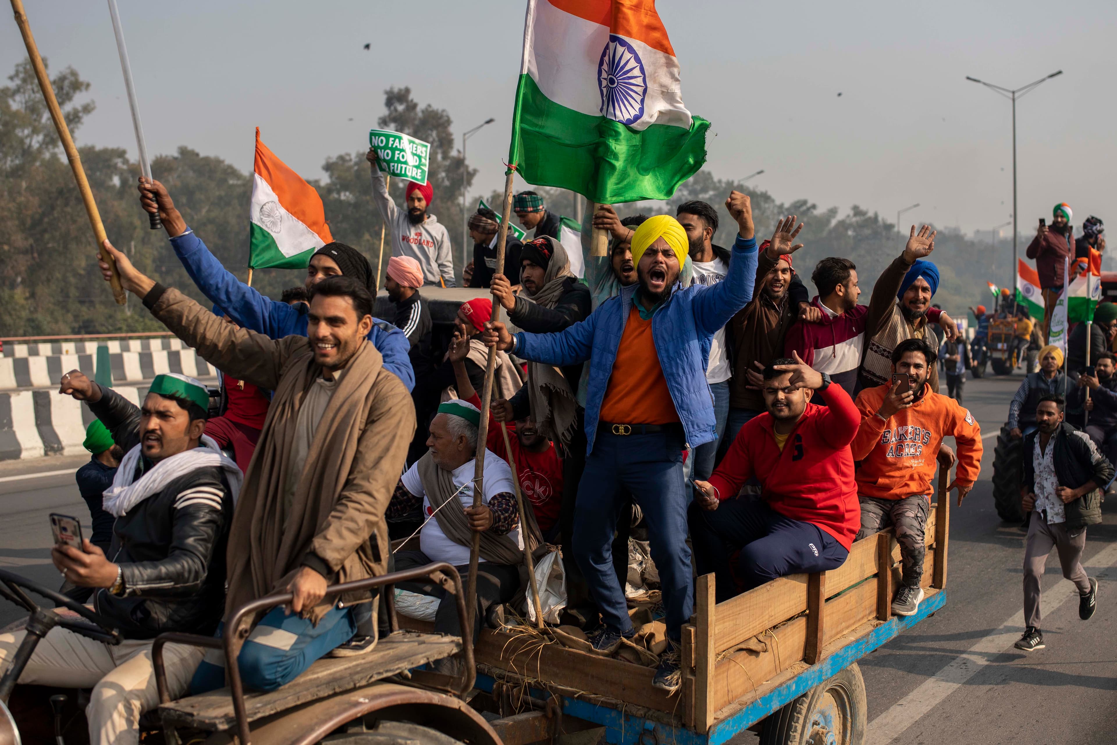 Tens of thousands of farmers drove a convoy of tractors into the Indian capital as the nation celebrated Republic Day on Tuesday in the backdrop of agricultural protests that have grown into a rebellion and rattled the government.