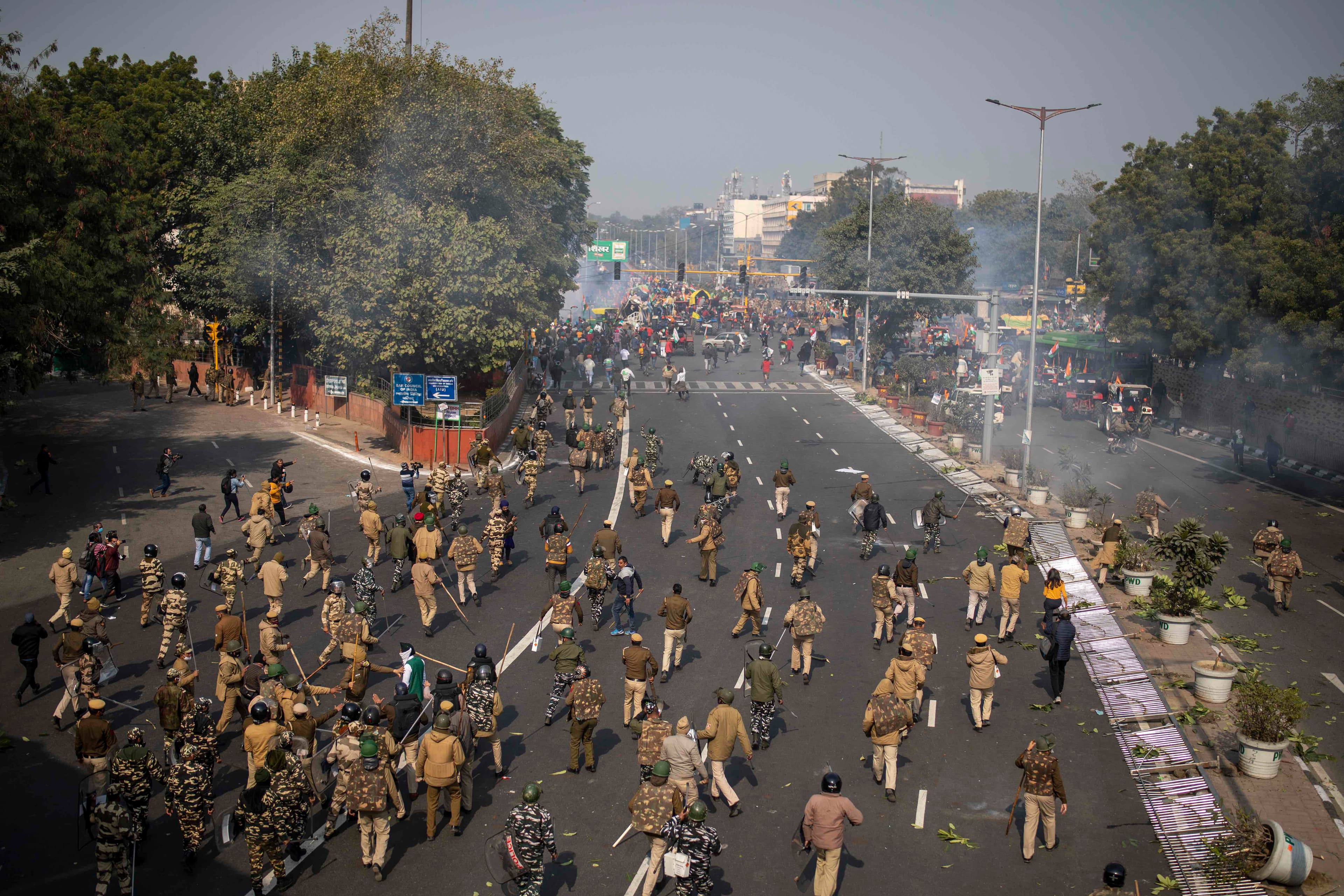 Protesters defied tear gas and stormed the historic Red Fort as India celebrated Republic Day.