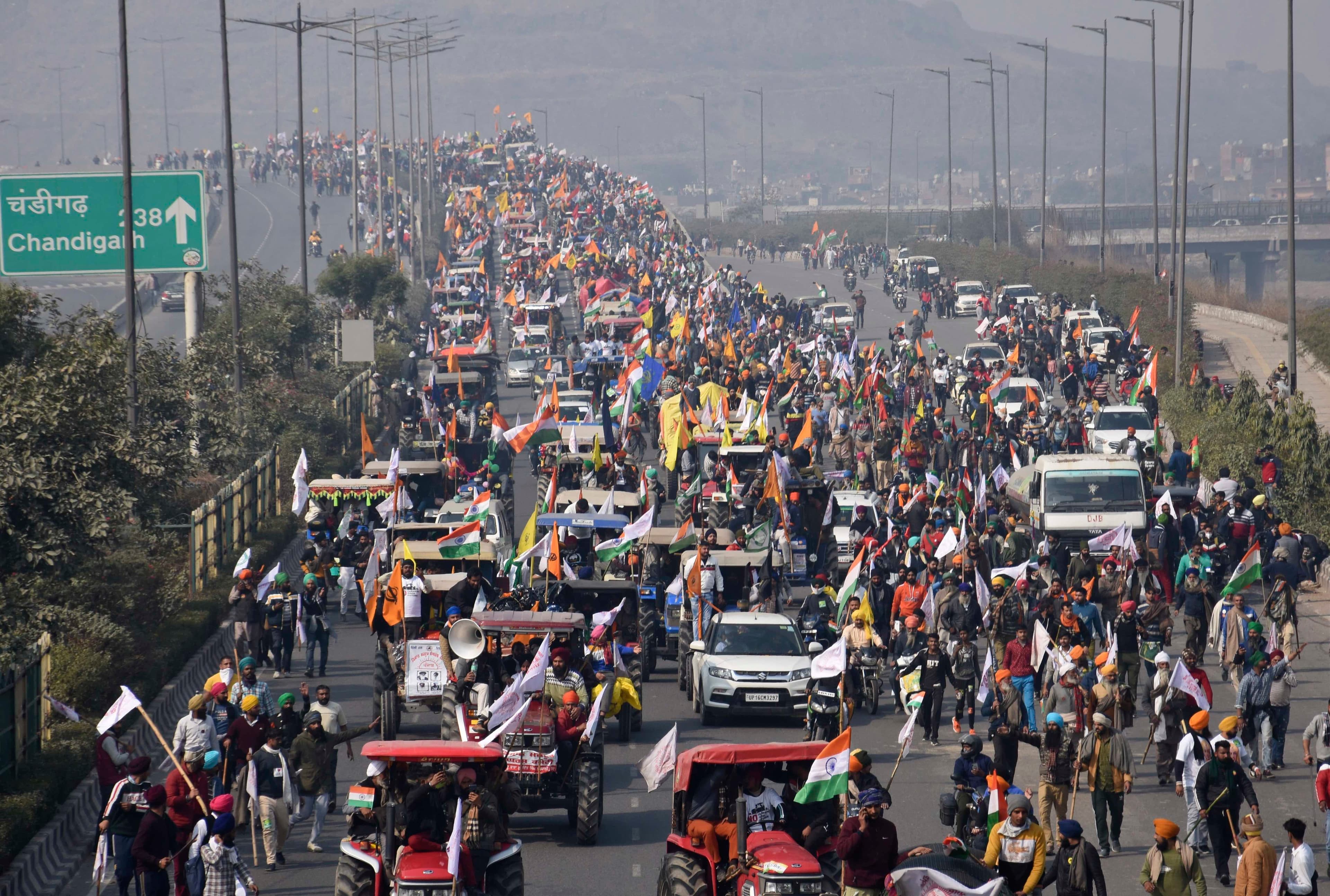 Farmers participate in a protest march towards the capital during India's Republic Day celebrations in New Delhi, India, Tuesday, Jan. 26, 2021.