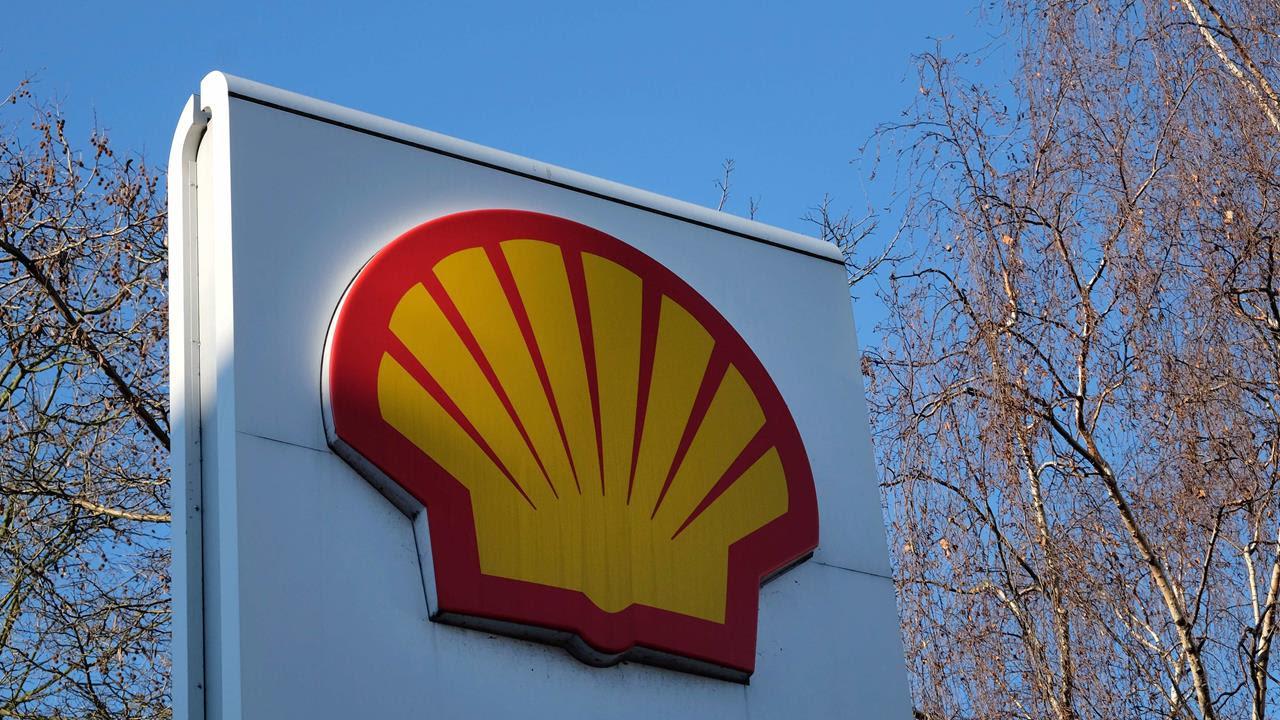 The Shell logo of a yellow shell outlined in red on a white background