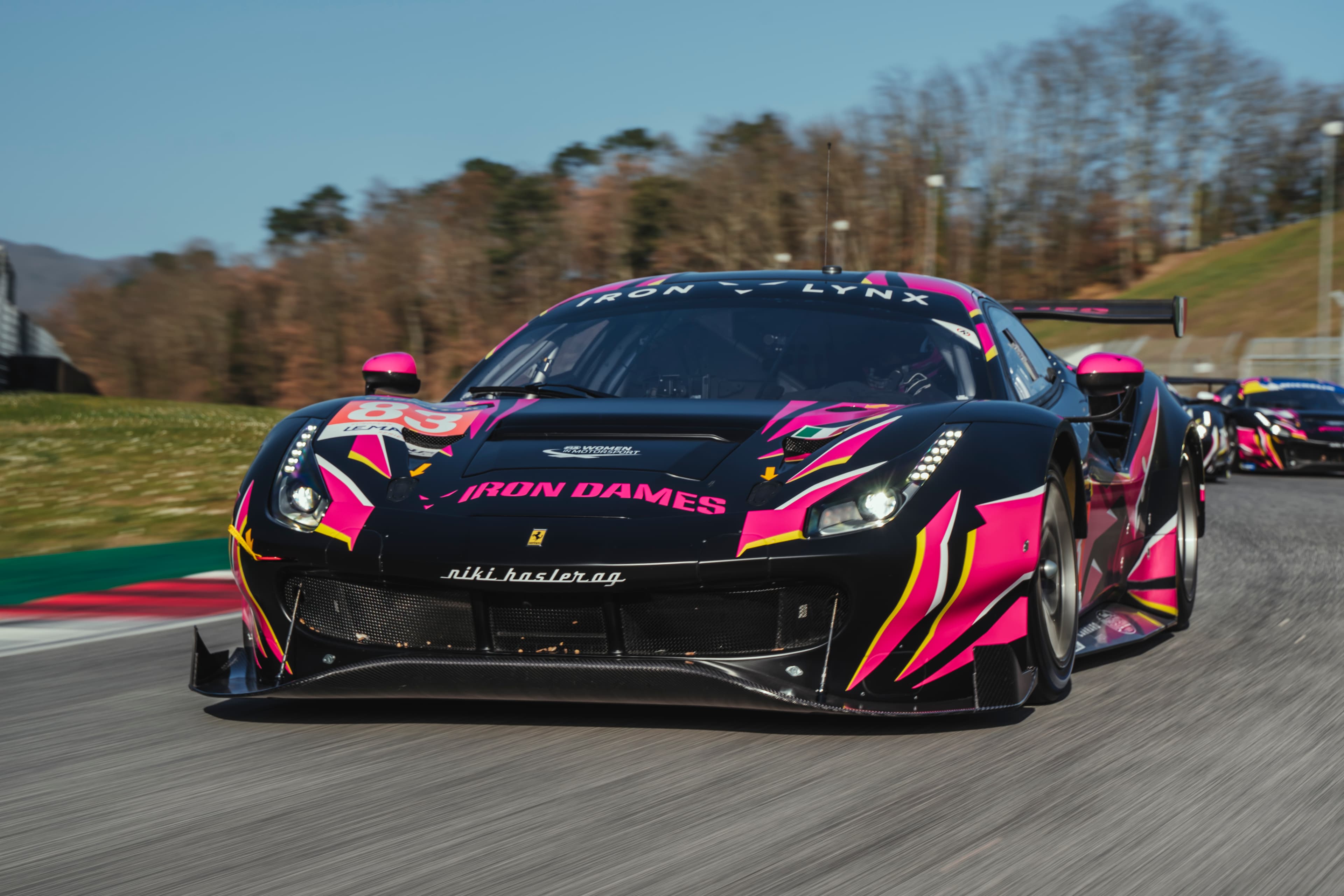 Close up of an Iron Dames race car.